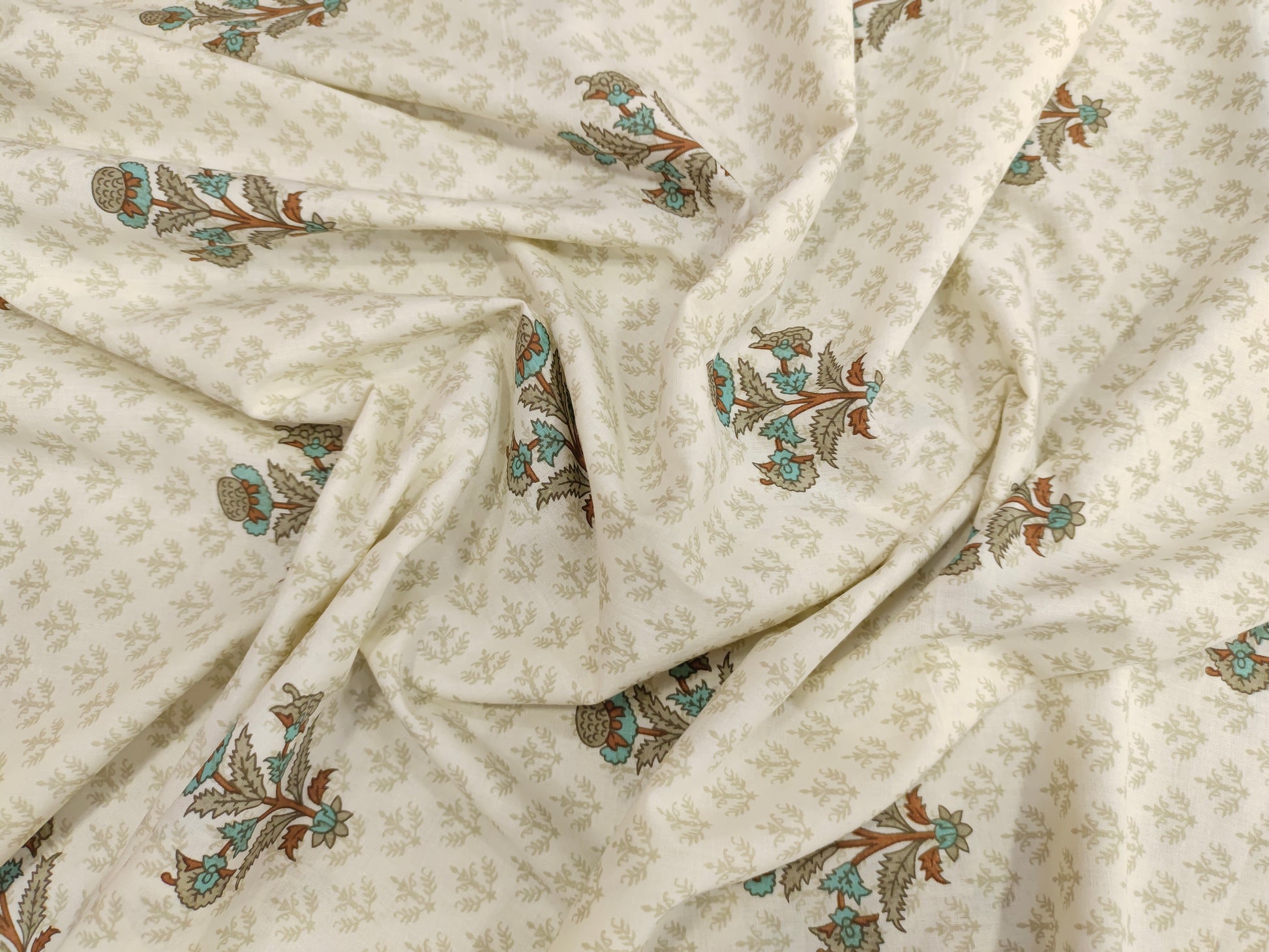 White base with brown, grey & blue print