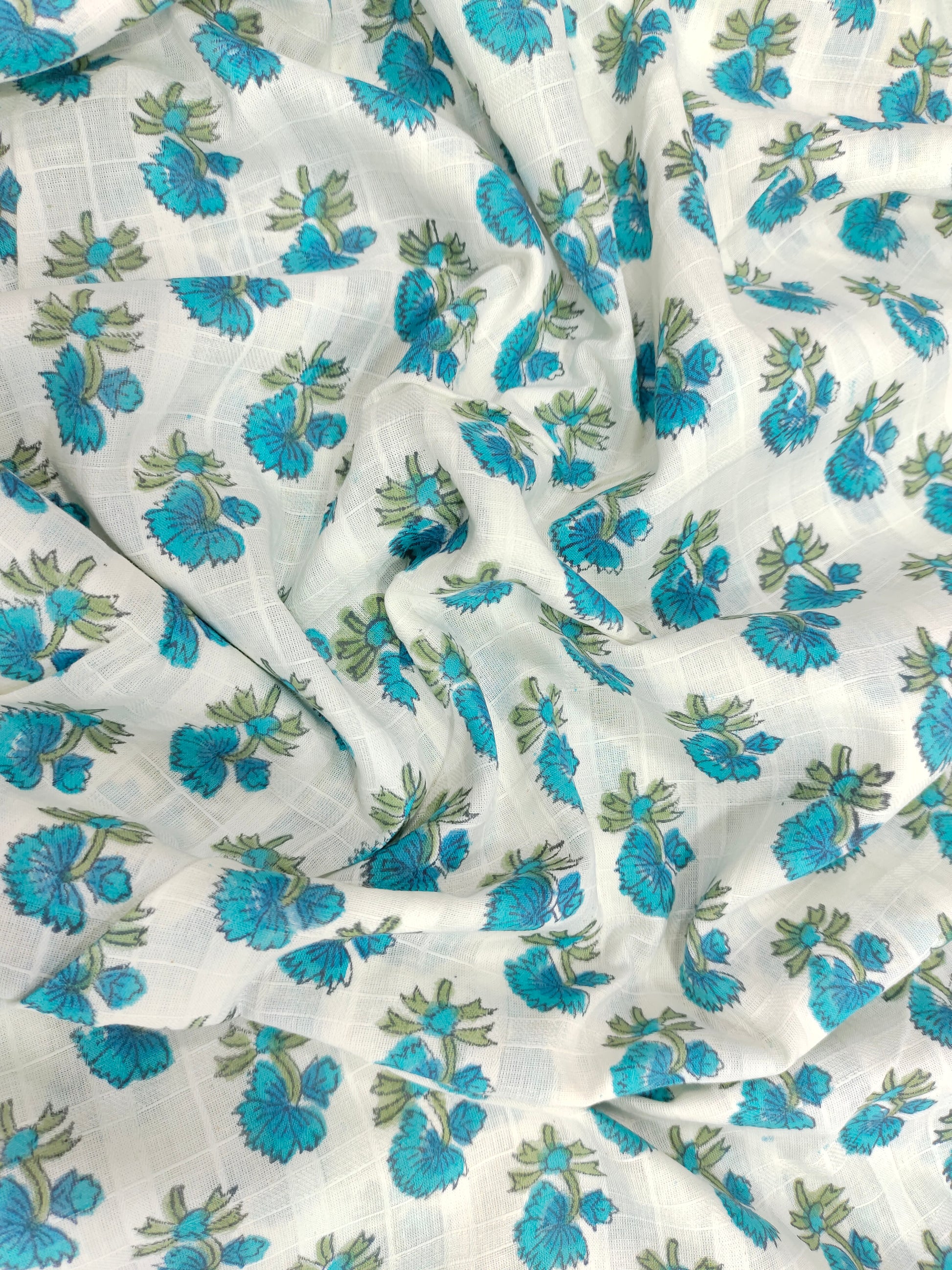 White base handblock print with blue and green