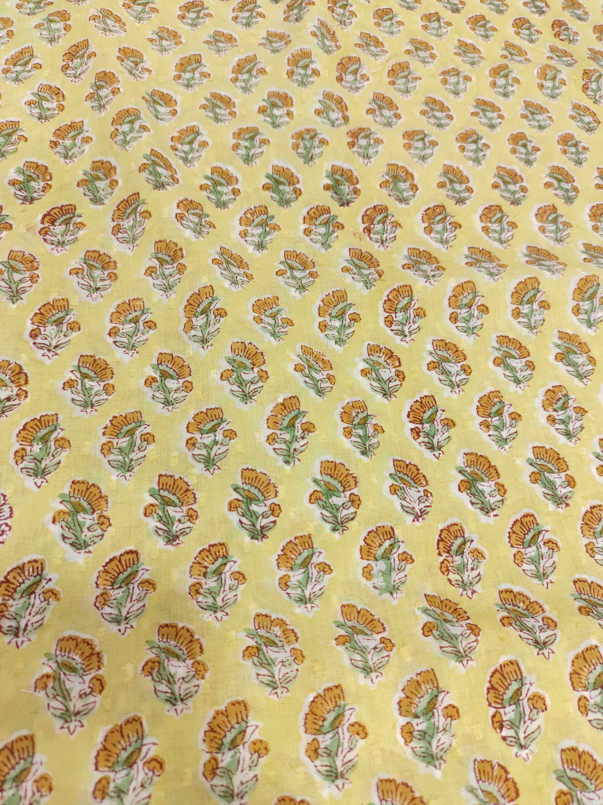 Yellow with small orange with green flowers cotton handblock print with special viwes