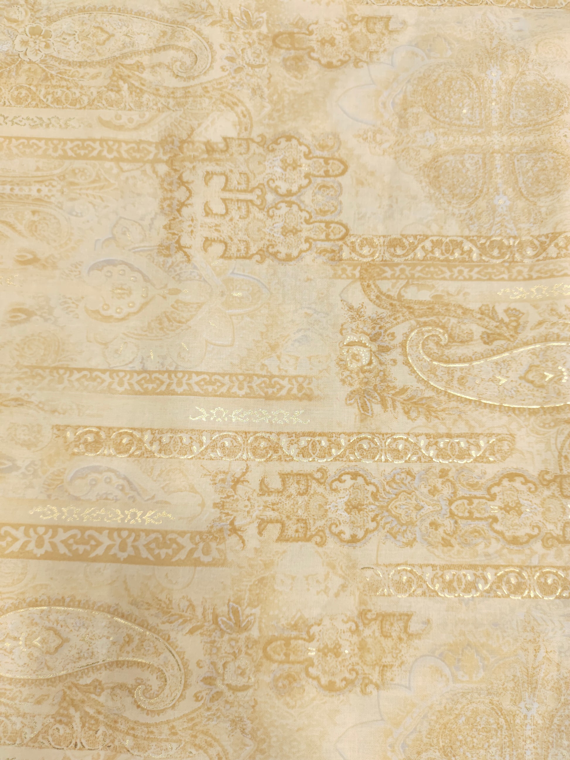 Beige with pasley with the gold finish