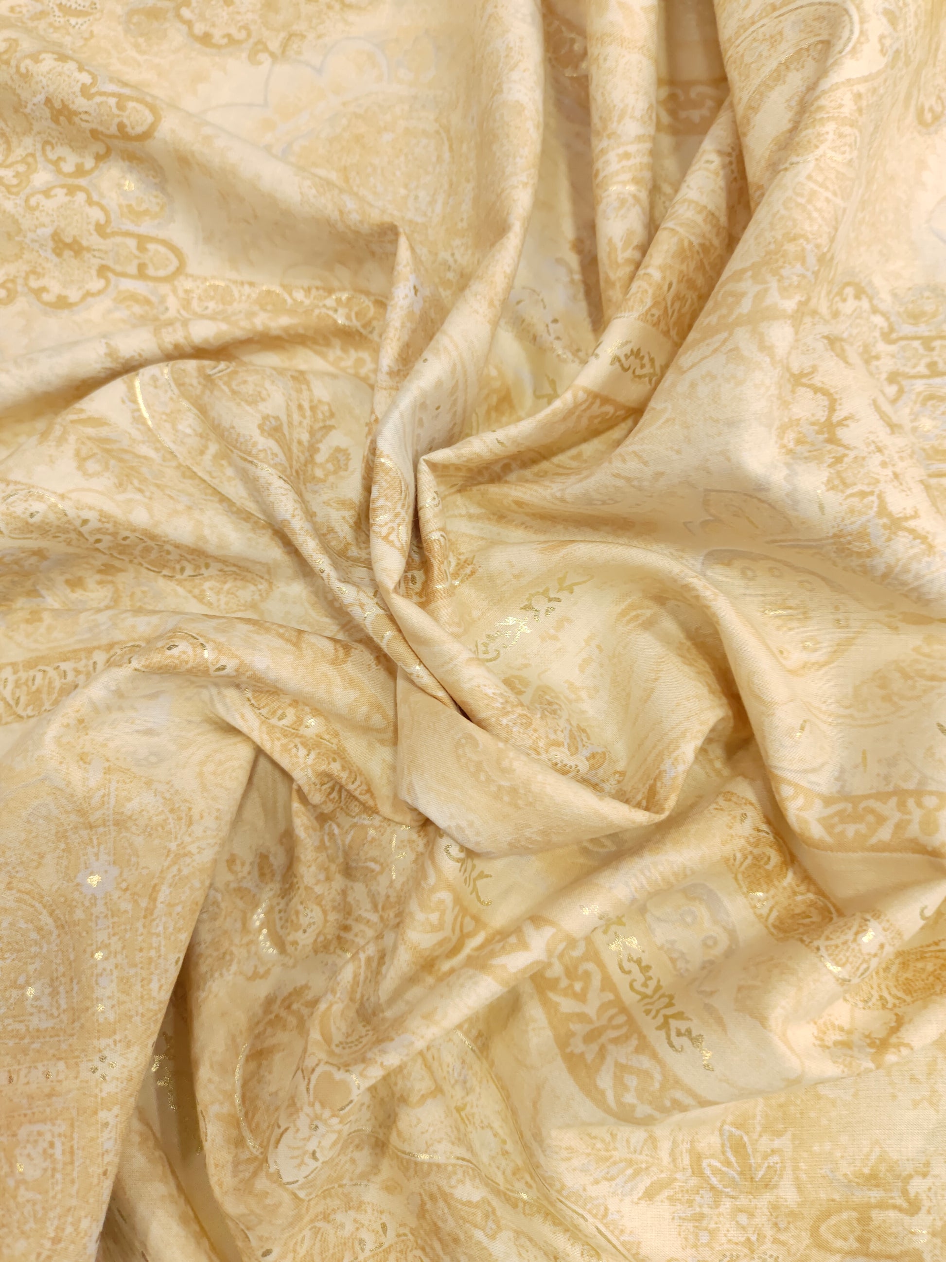 Beige with pasley with the gold finish