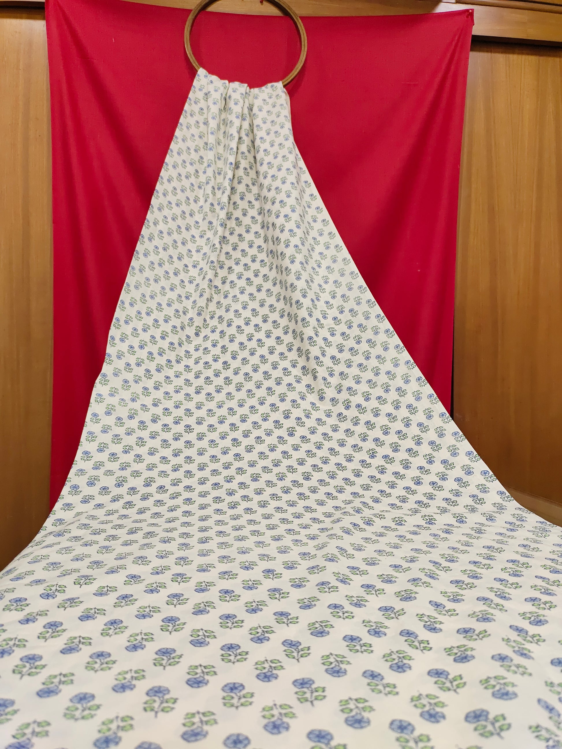 Off white cotton  base fabric with blue print