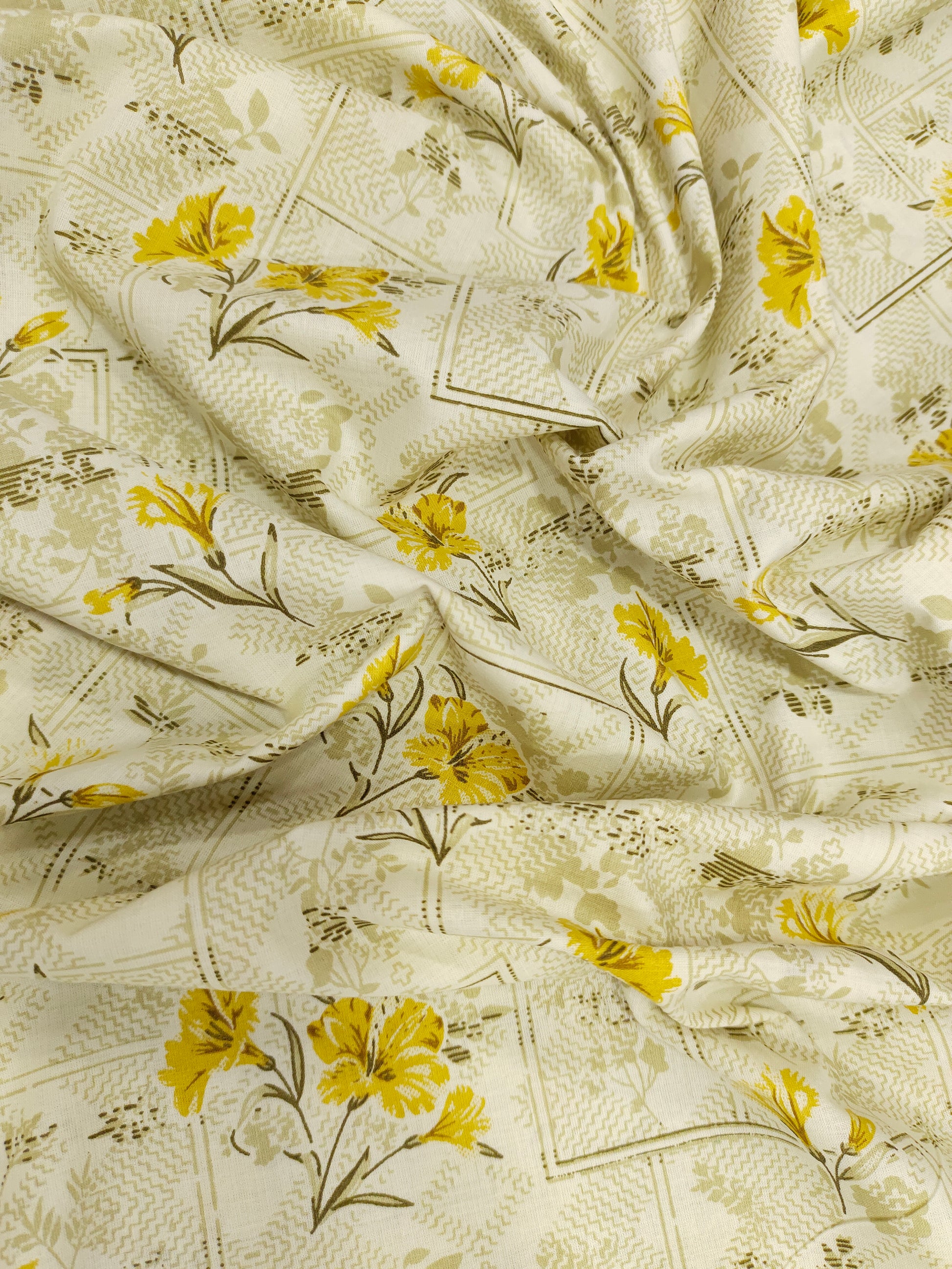 cream base with yellow flowers