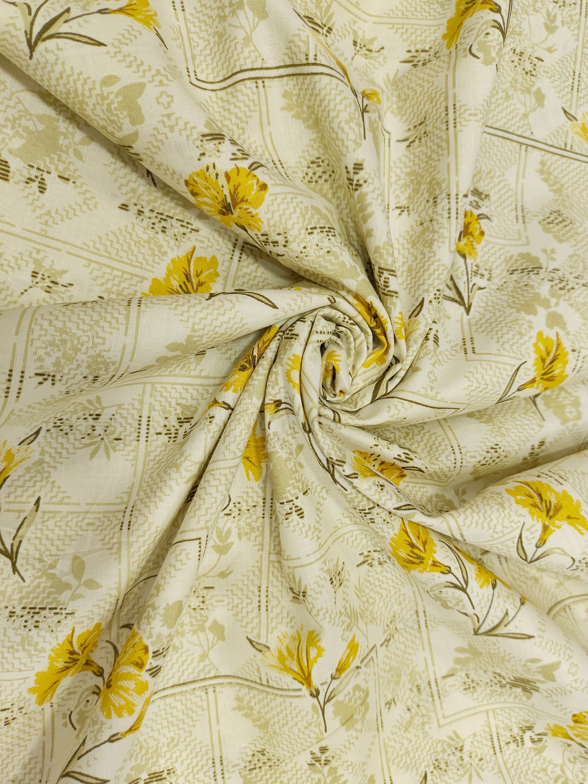 cream base with yellow flowers