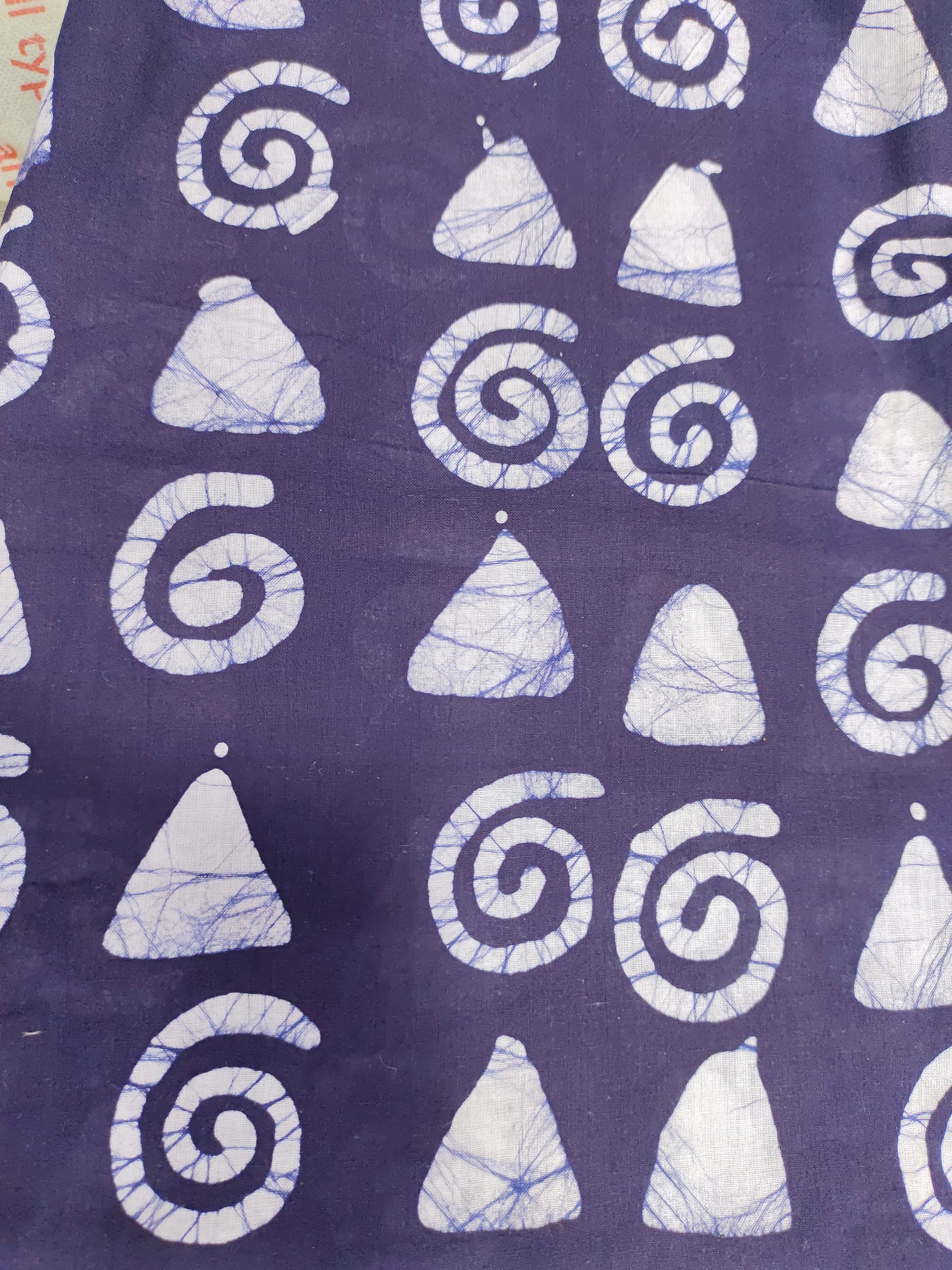 Navy base with white batiq