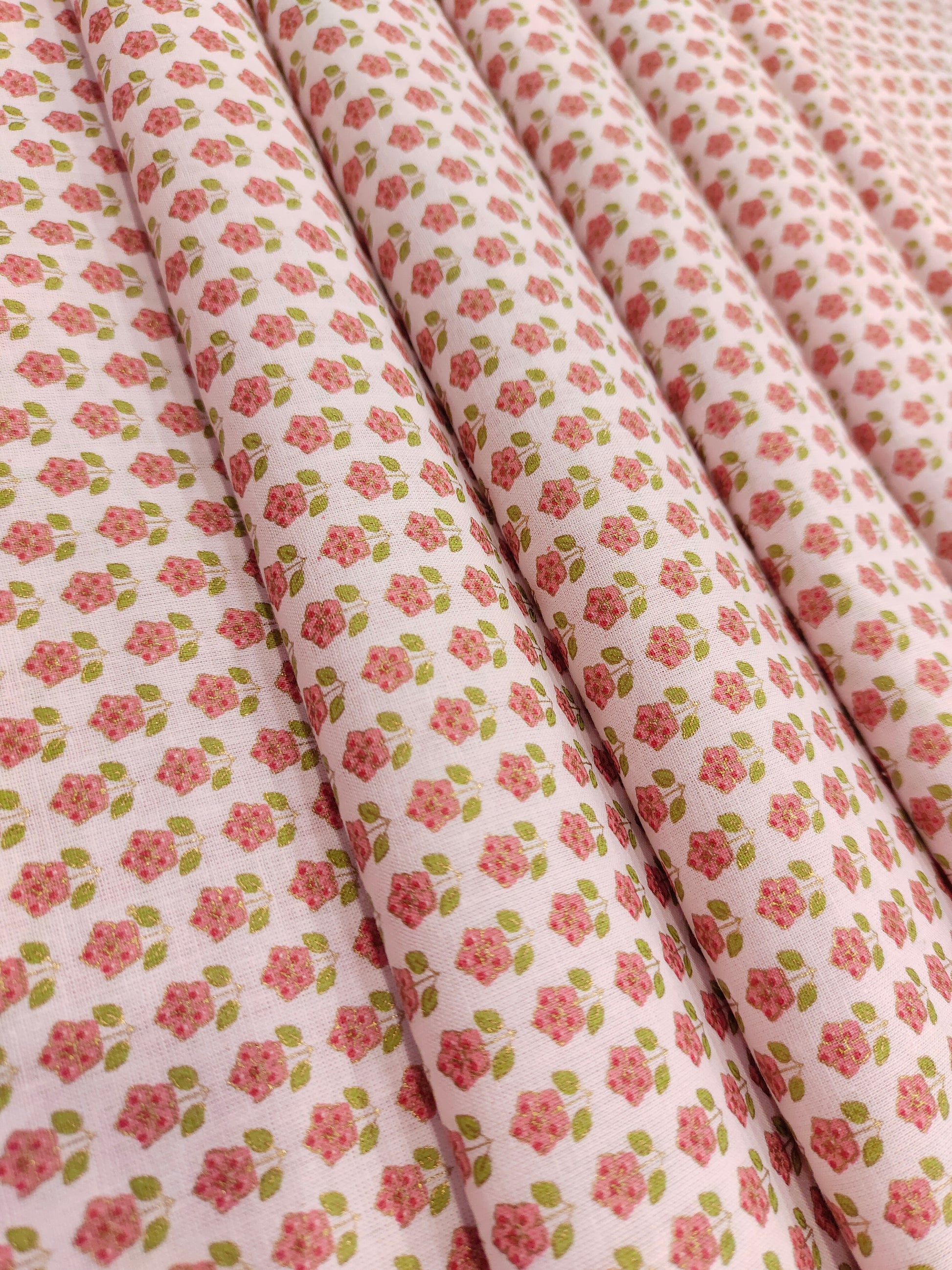 White base screen print of pink flowers