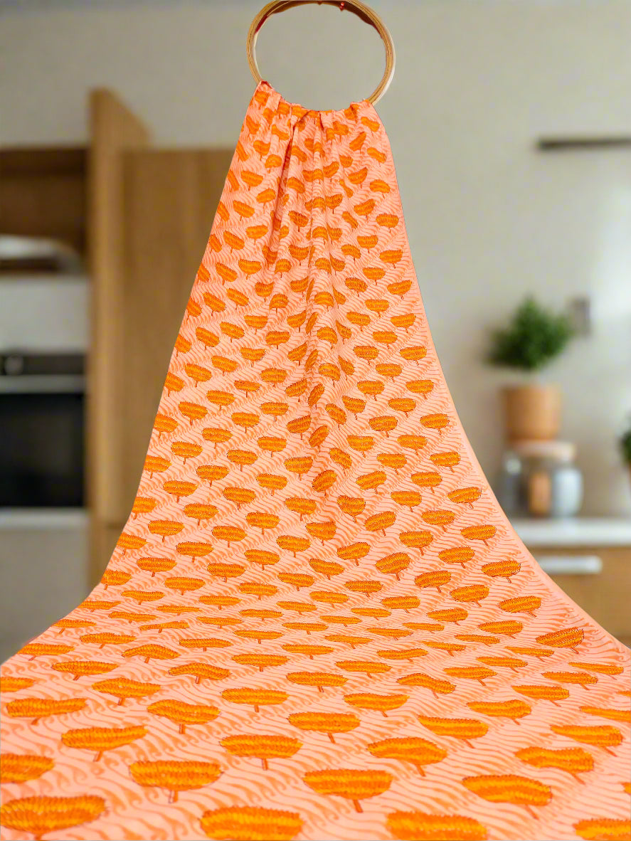 orange handblock print with orange flowers