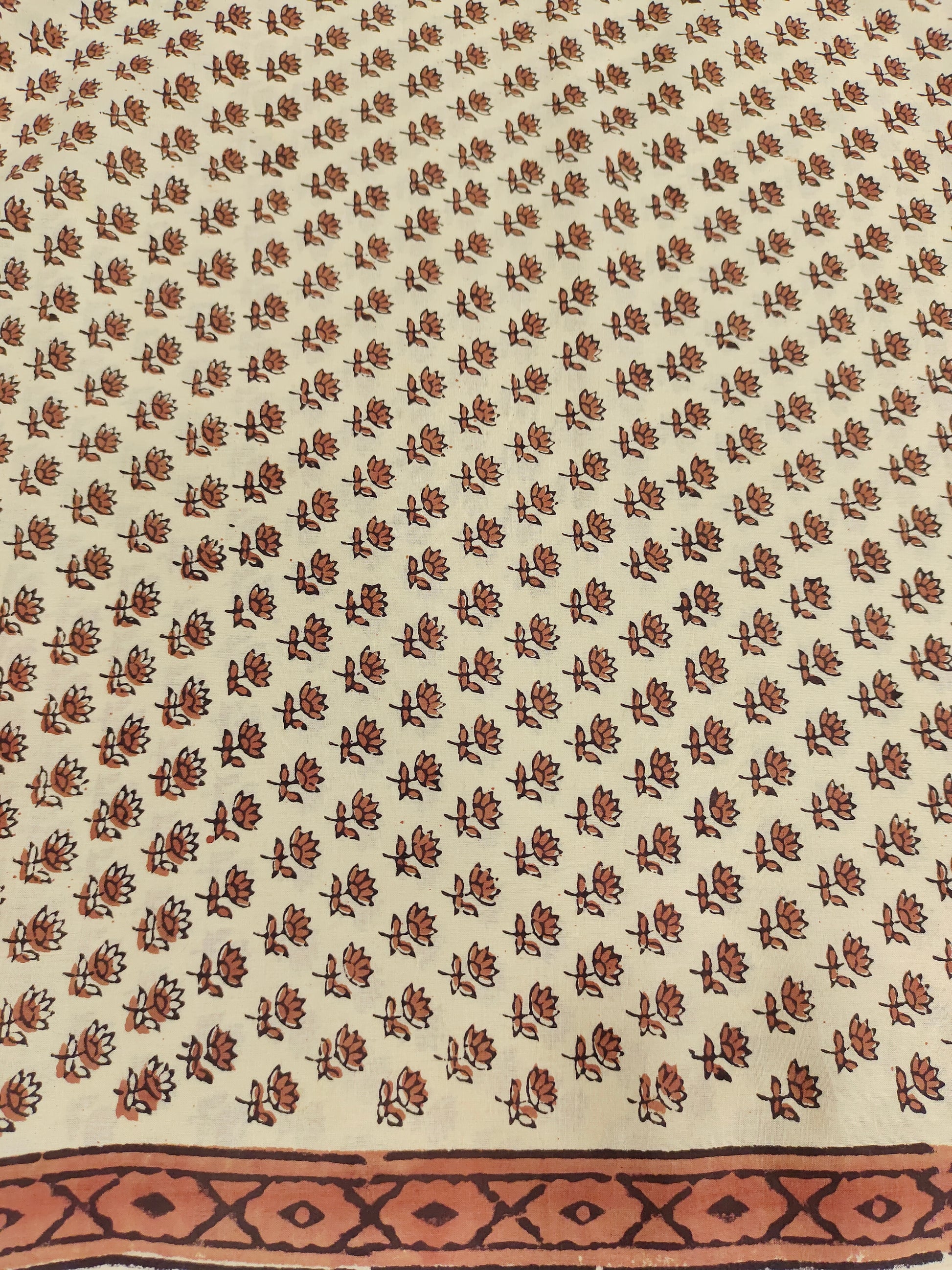 Beige base with rust very small hand block print with border