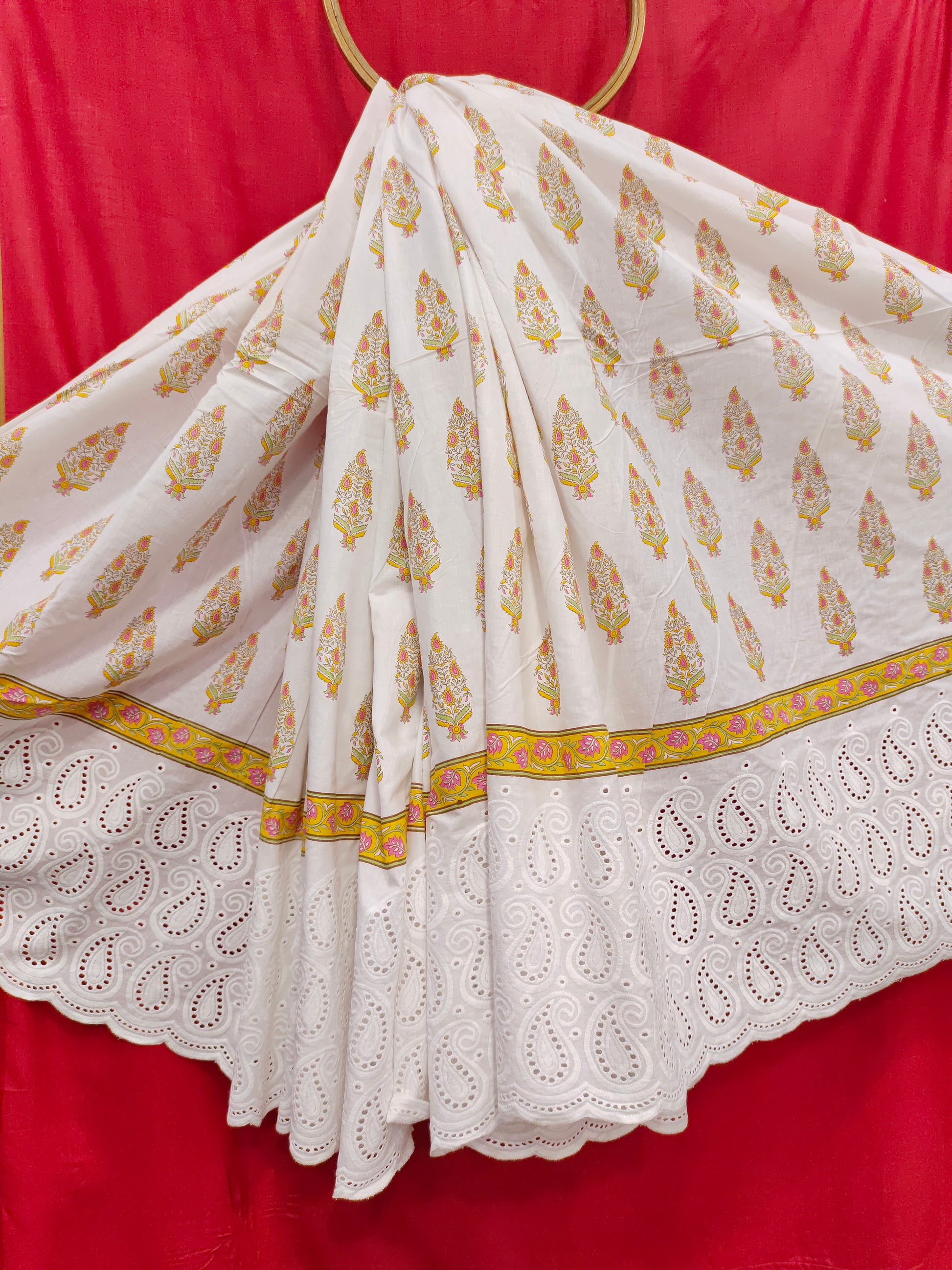 White daman cutwork border with yellow print
