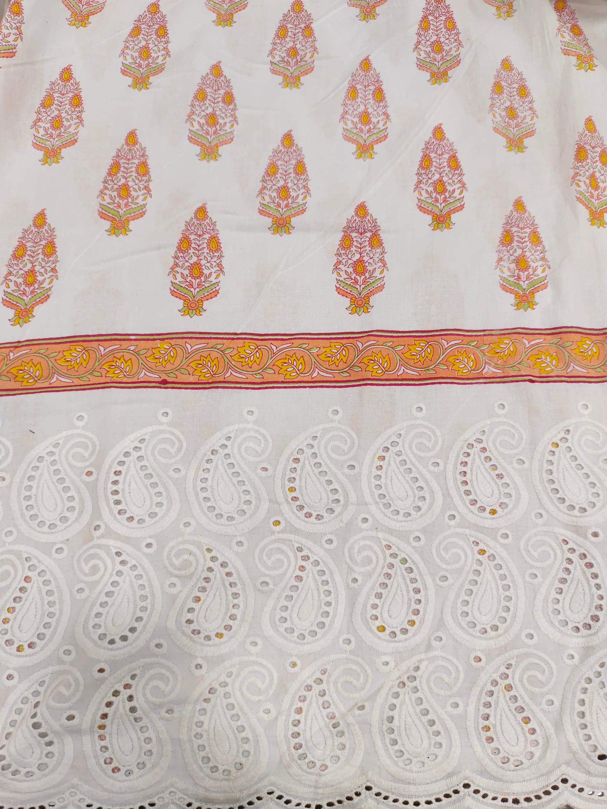 White cutwork daman fabric with orange print