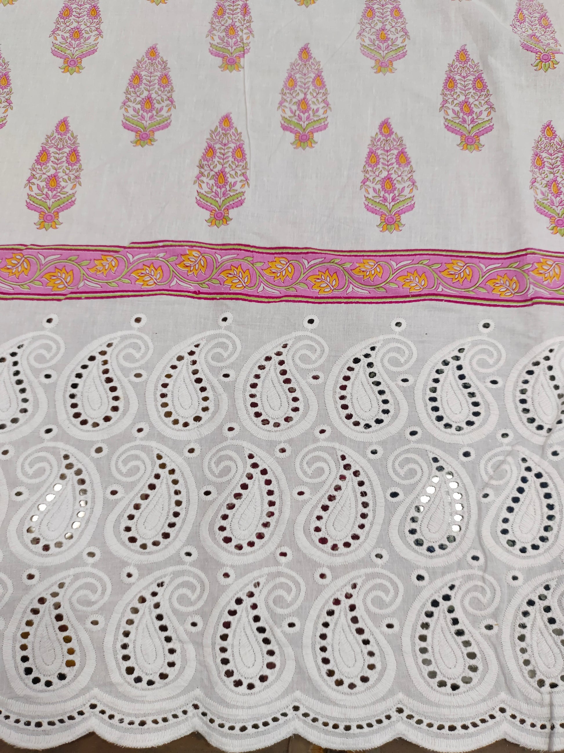 White daman cutwork embroidered fabric with pink print