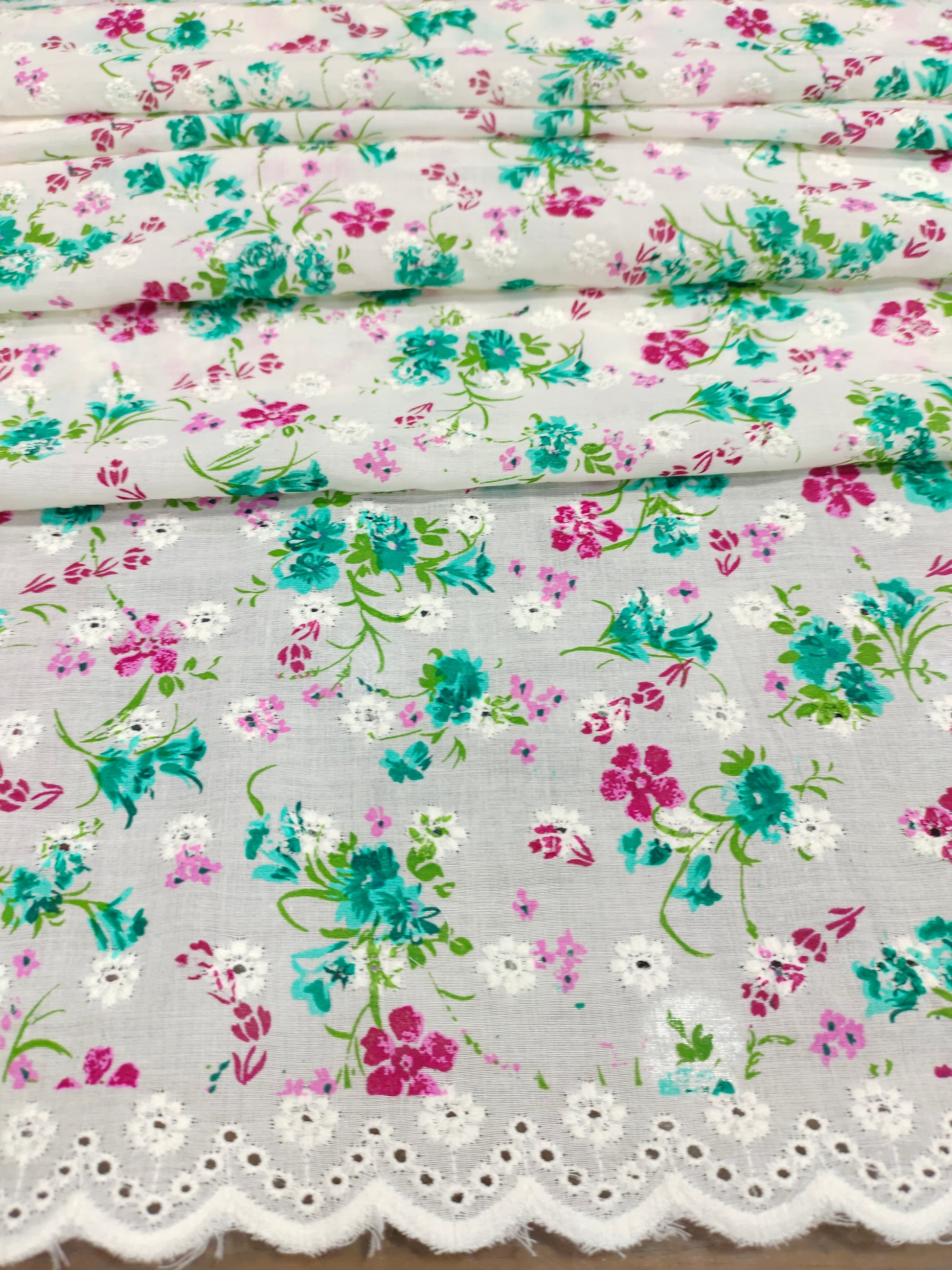 Offwhite embroidered fabric with green and pink print