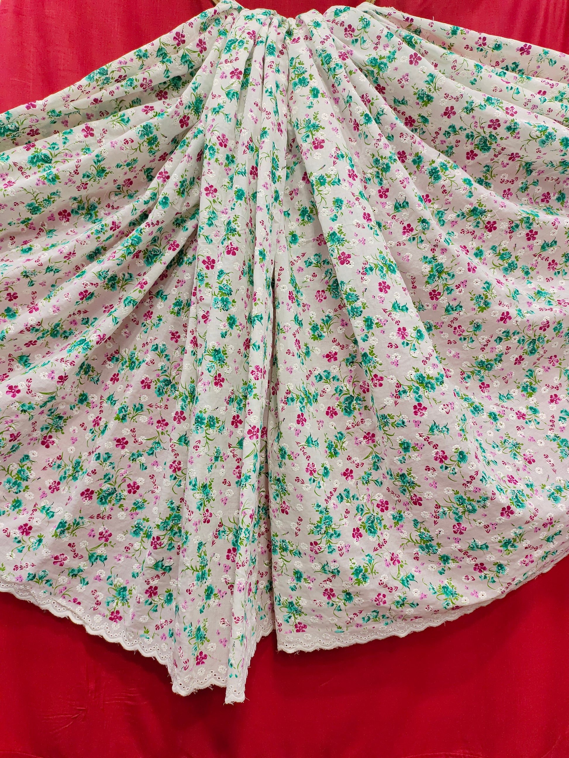 Offwhite embroidered fabric with green and pink print