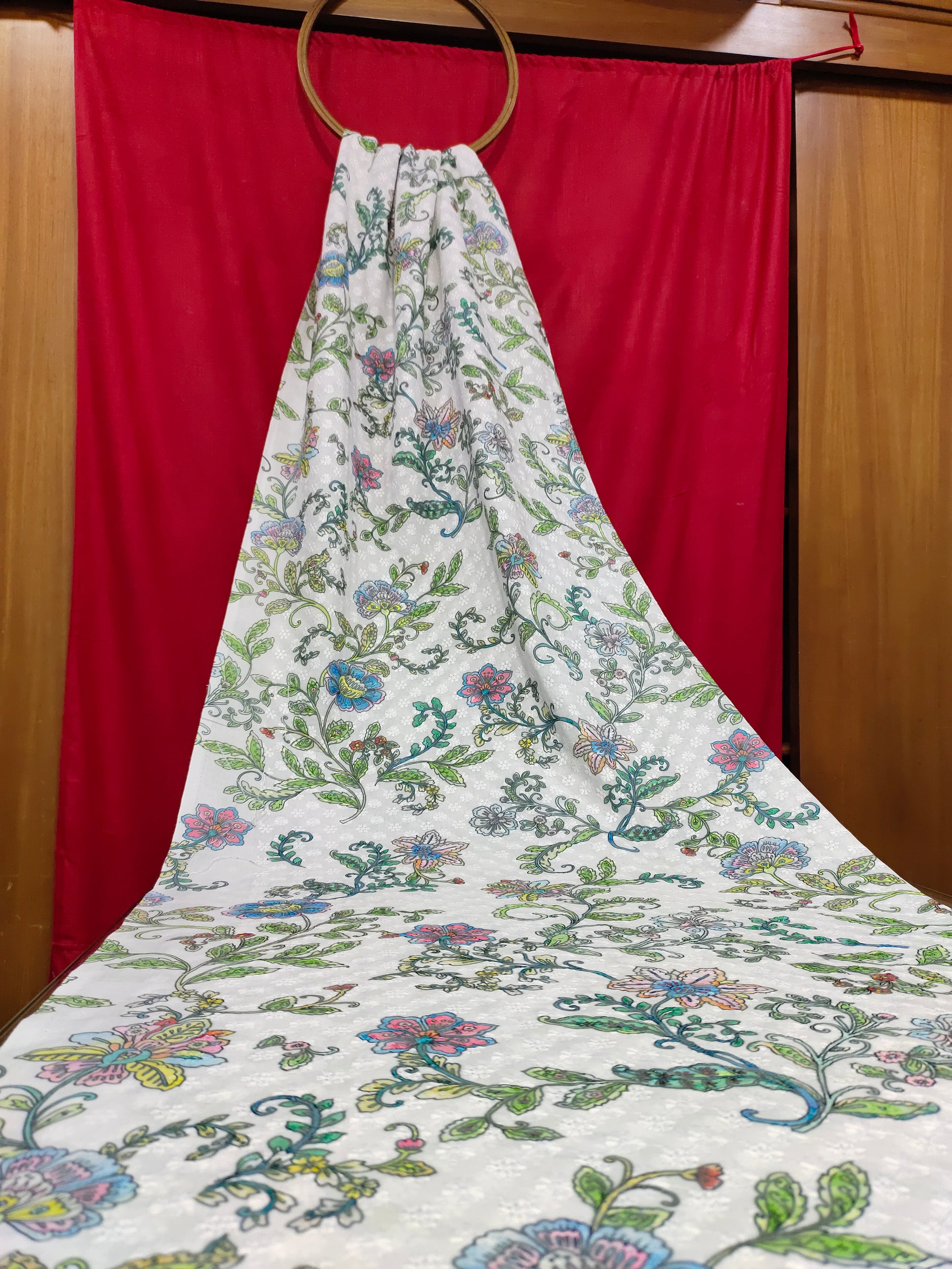 White embroidered fabric digital print with blue pink and green