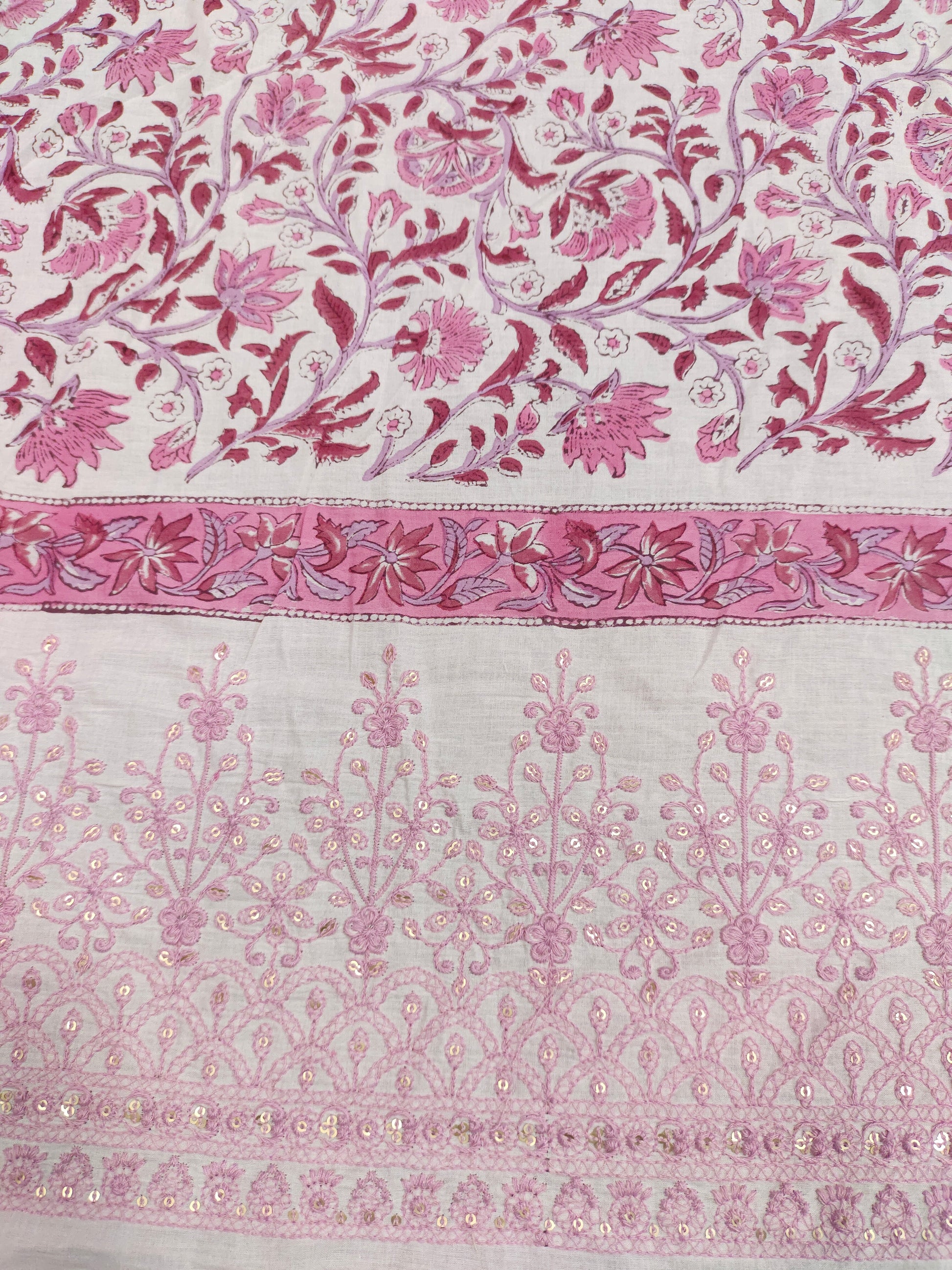 White fabric with pink handblock print and added with schiffli daman