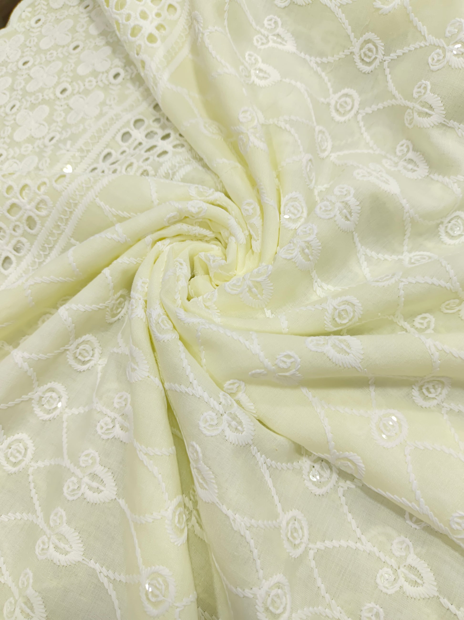 Light lemon pure cotton fabric with white cut work embroidery