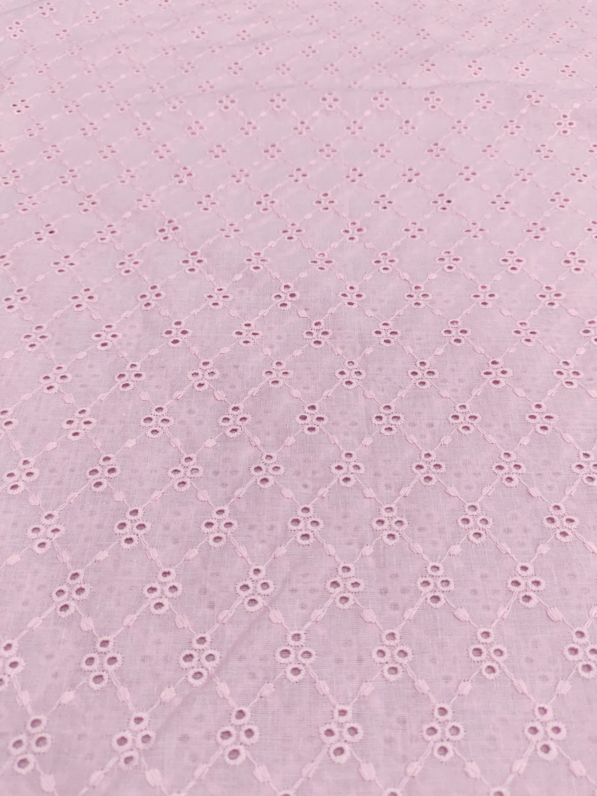 cotton fabric embroidery pink in color