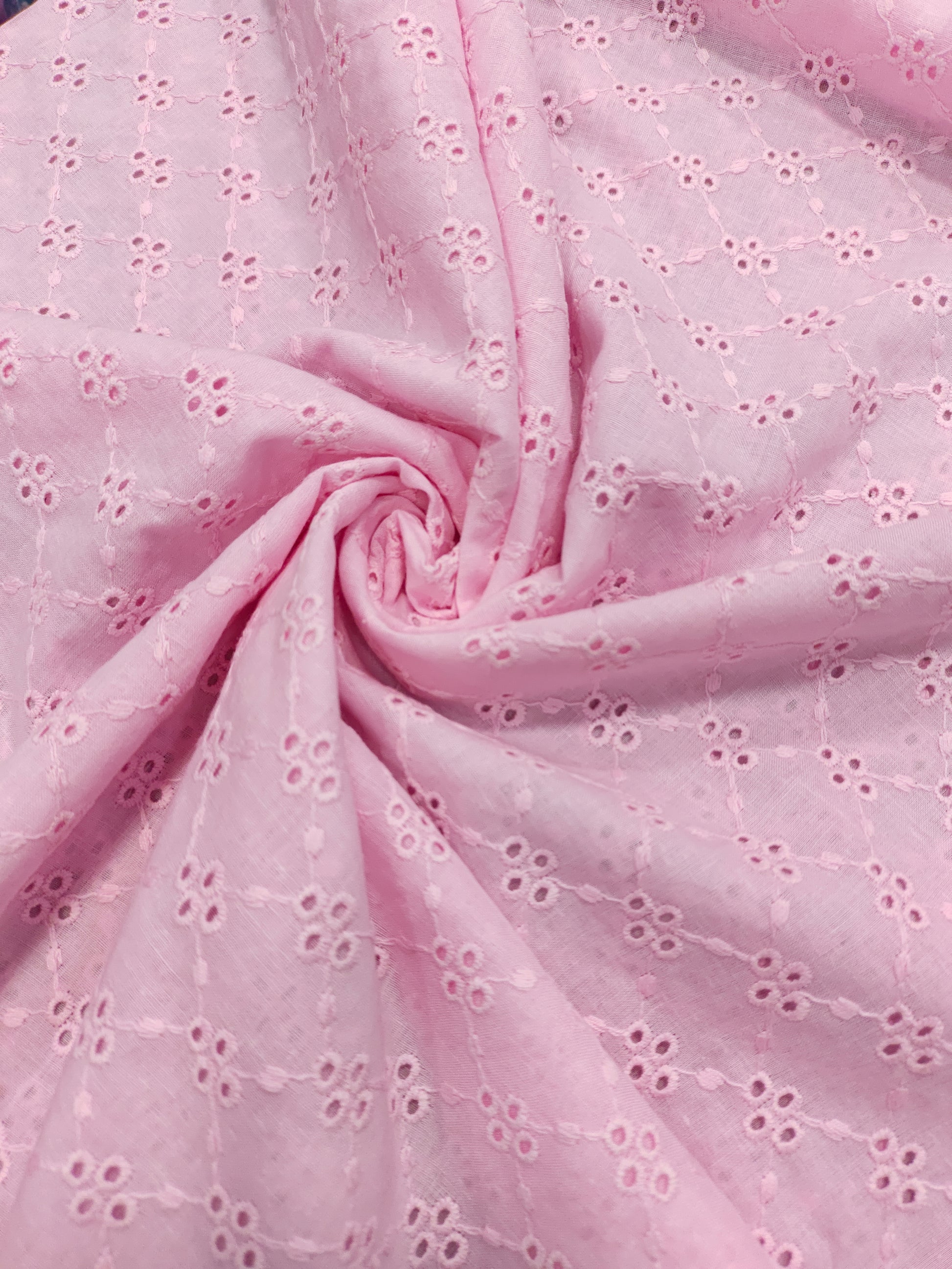 cotton fabric embroidery pink in color