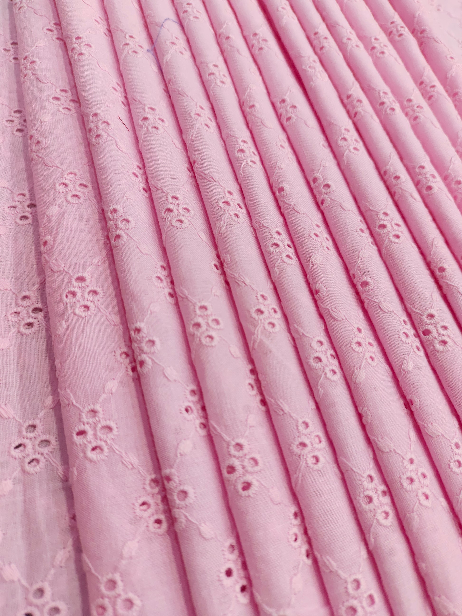 cotton fabric embroidery pink in color