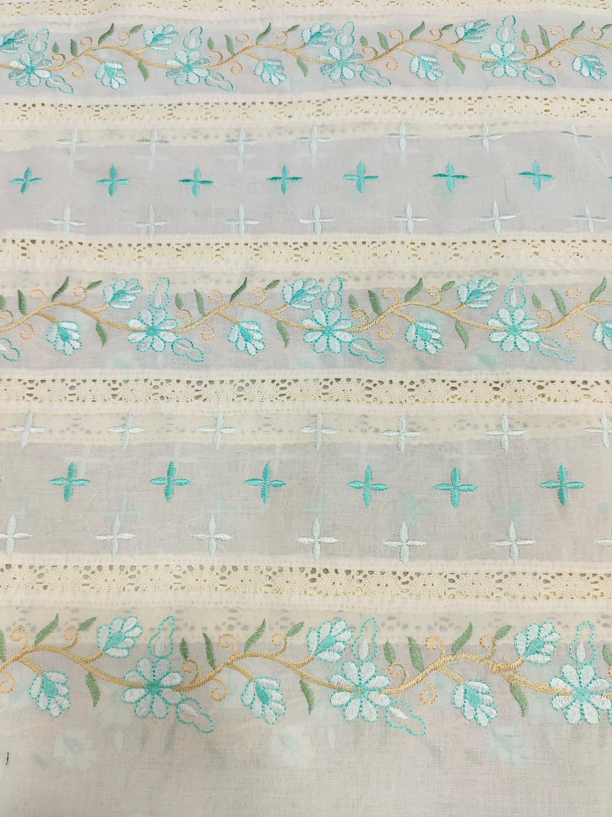 Cream  fabric with pista embroidery and  crochet lace