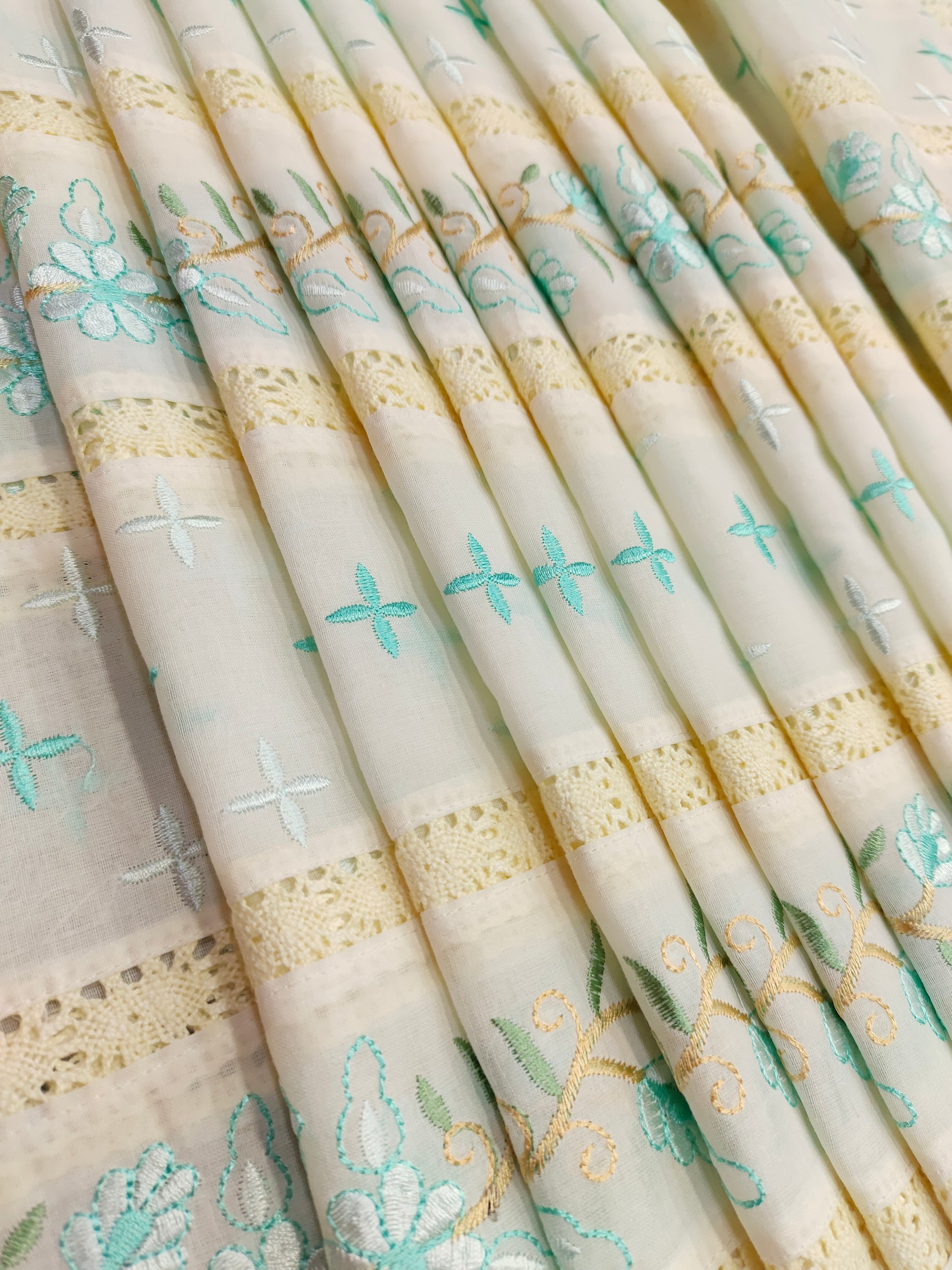 Cream  fabric with pista embroidery and  crochet lace