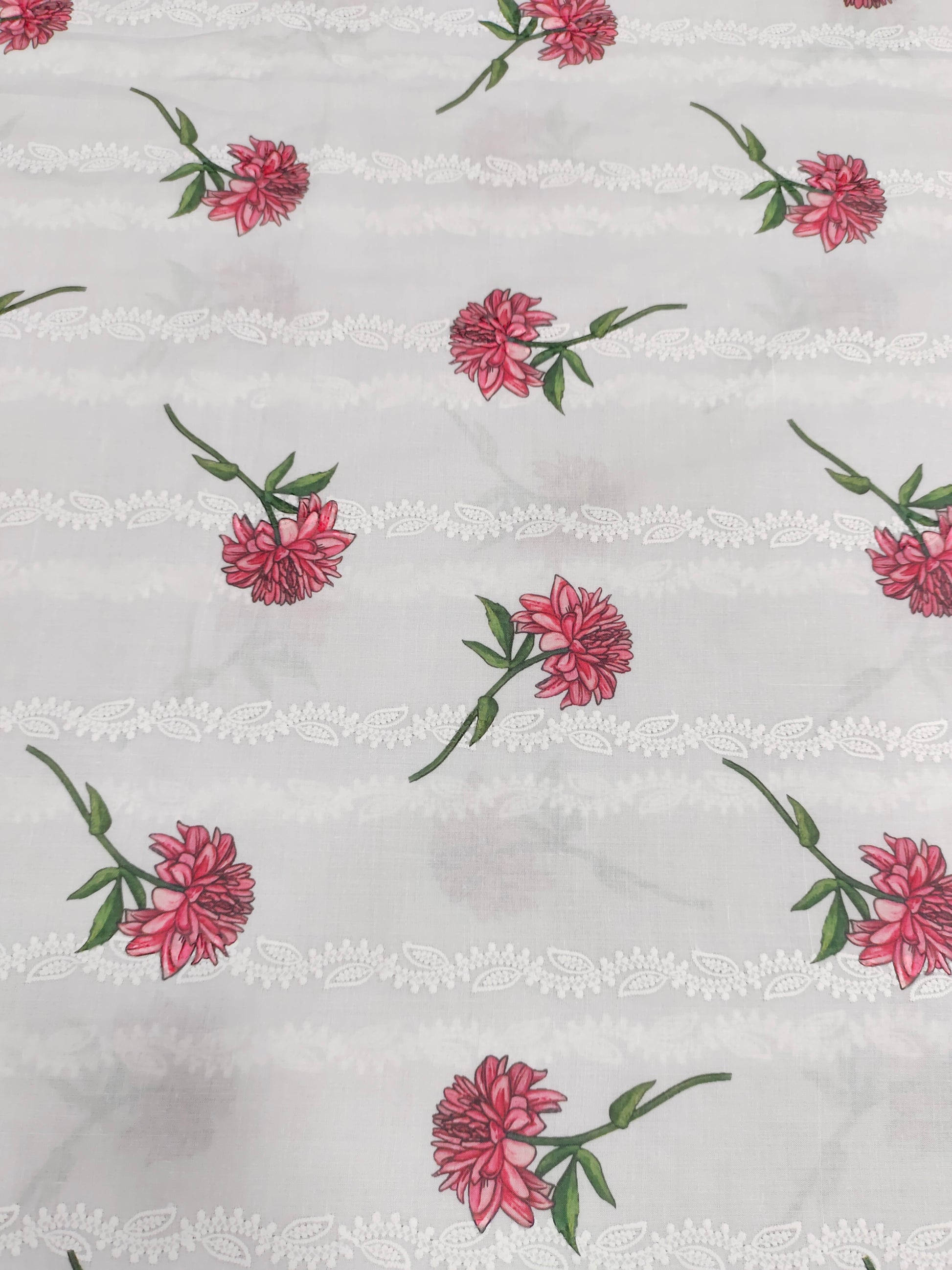 White embroidered with red flowers