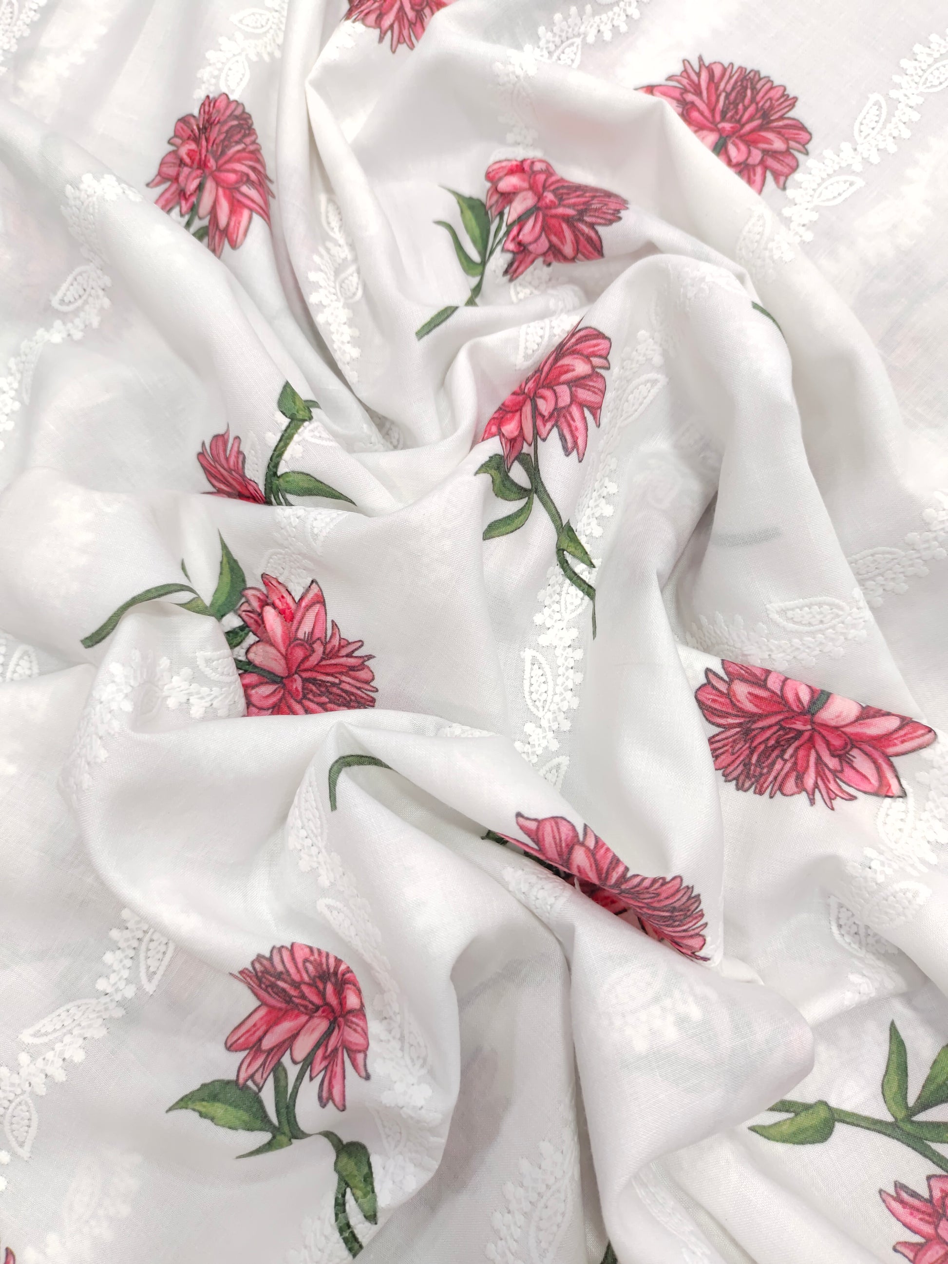 White embroidered with red flowers