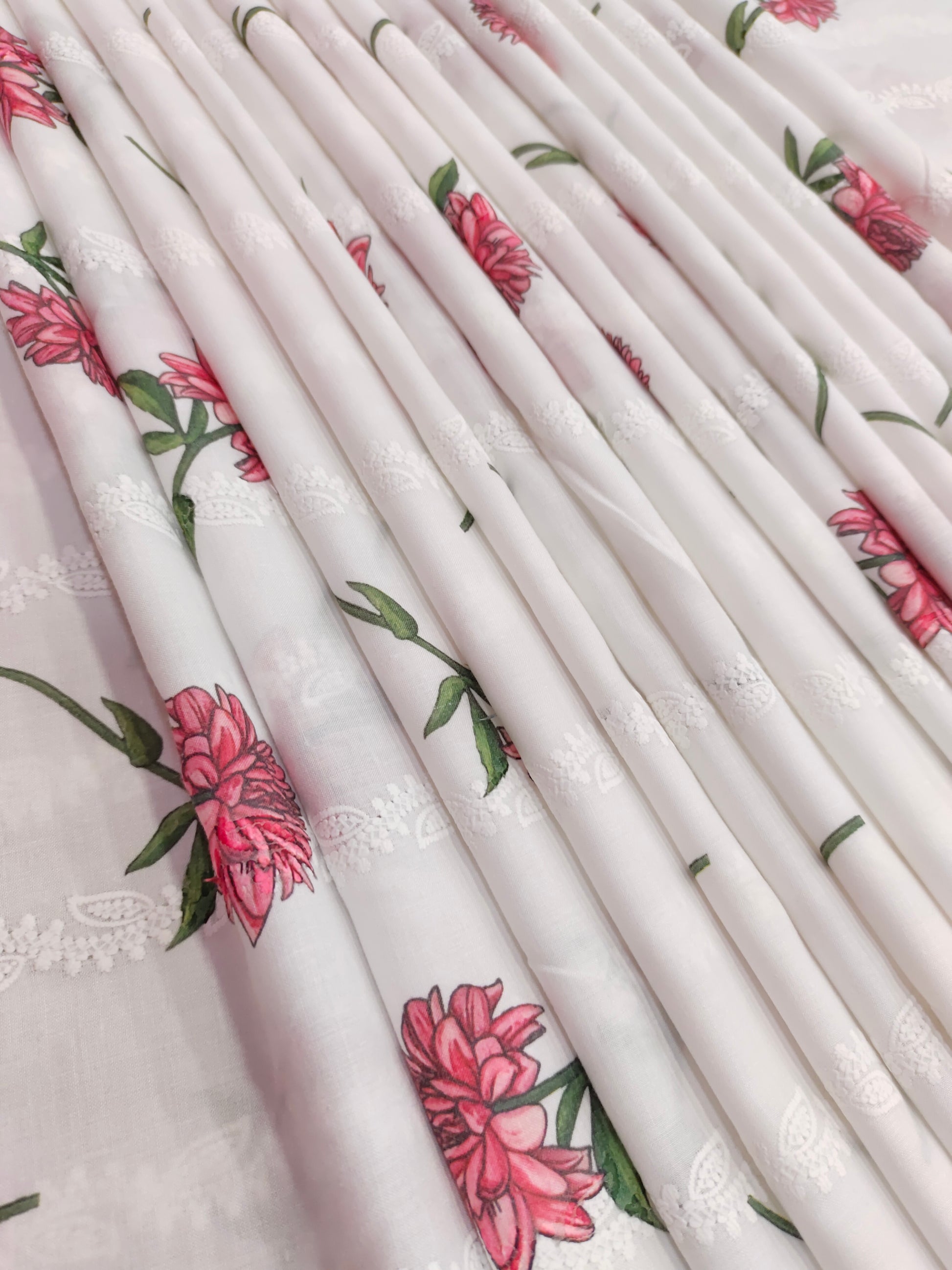 White embroidered with red flowers