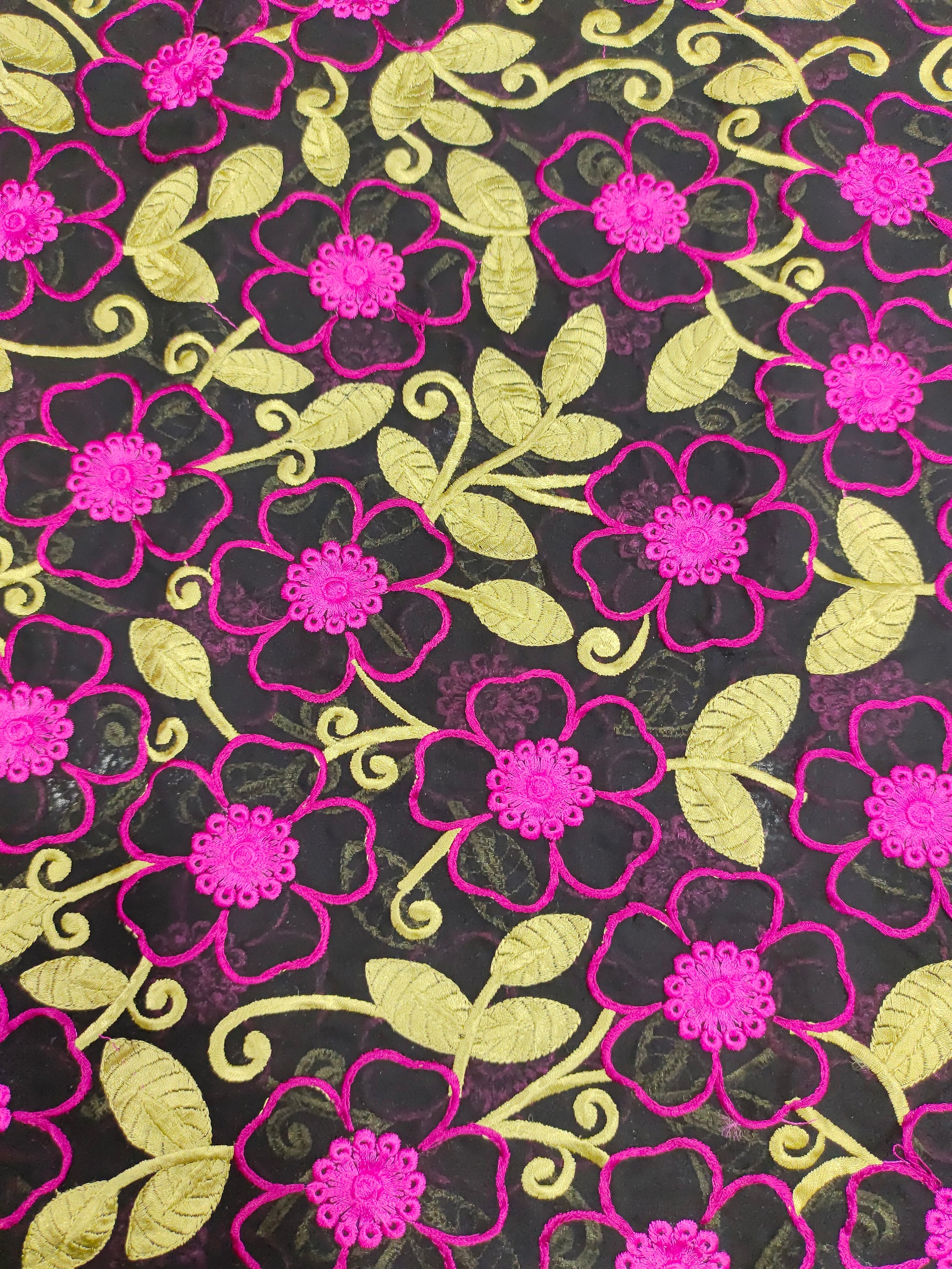 Black voile fabric with dark pink and green