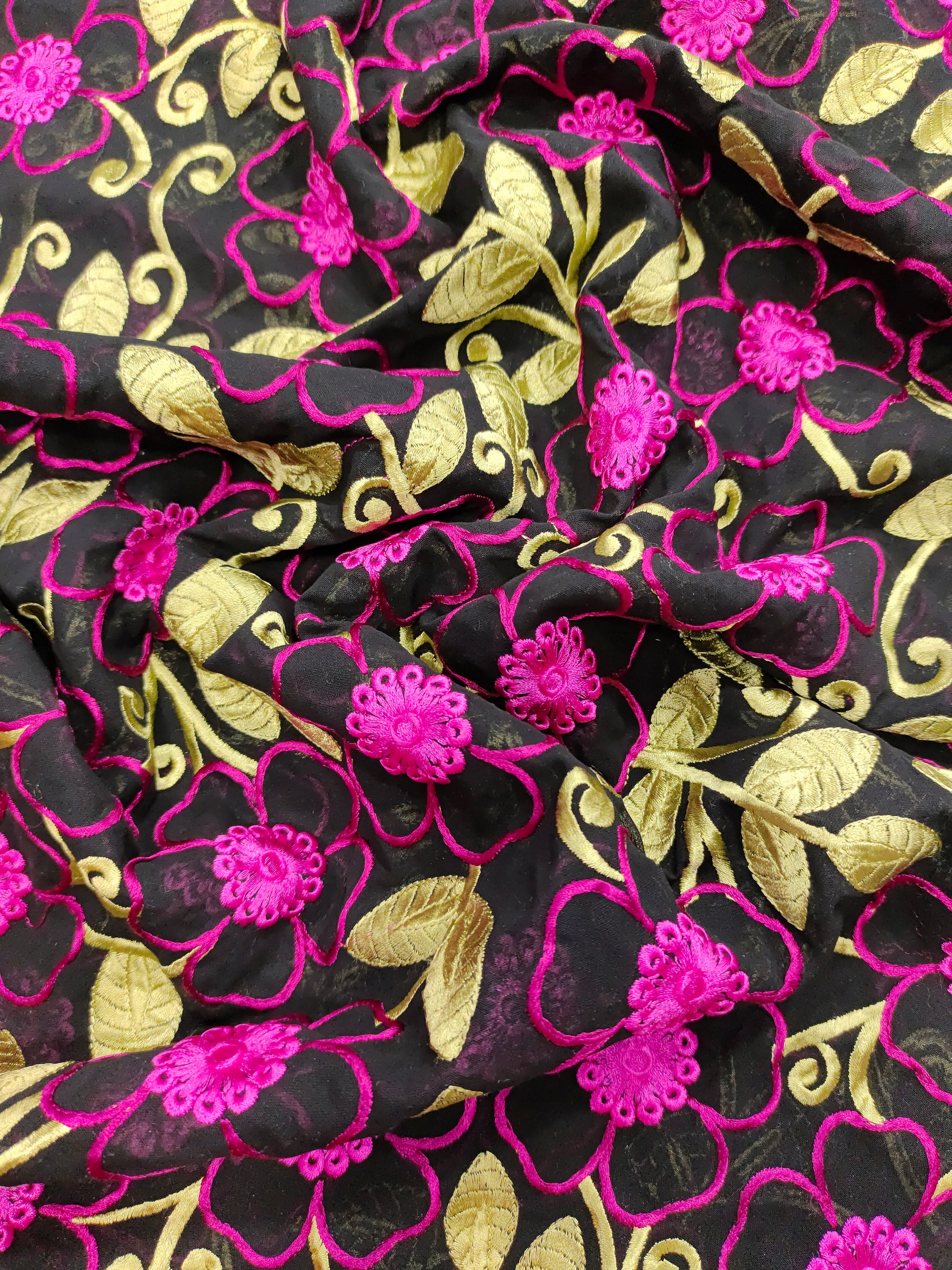 Black voile fabric with dark pink and green