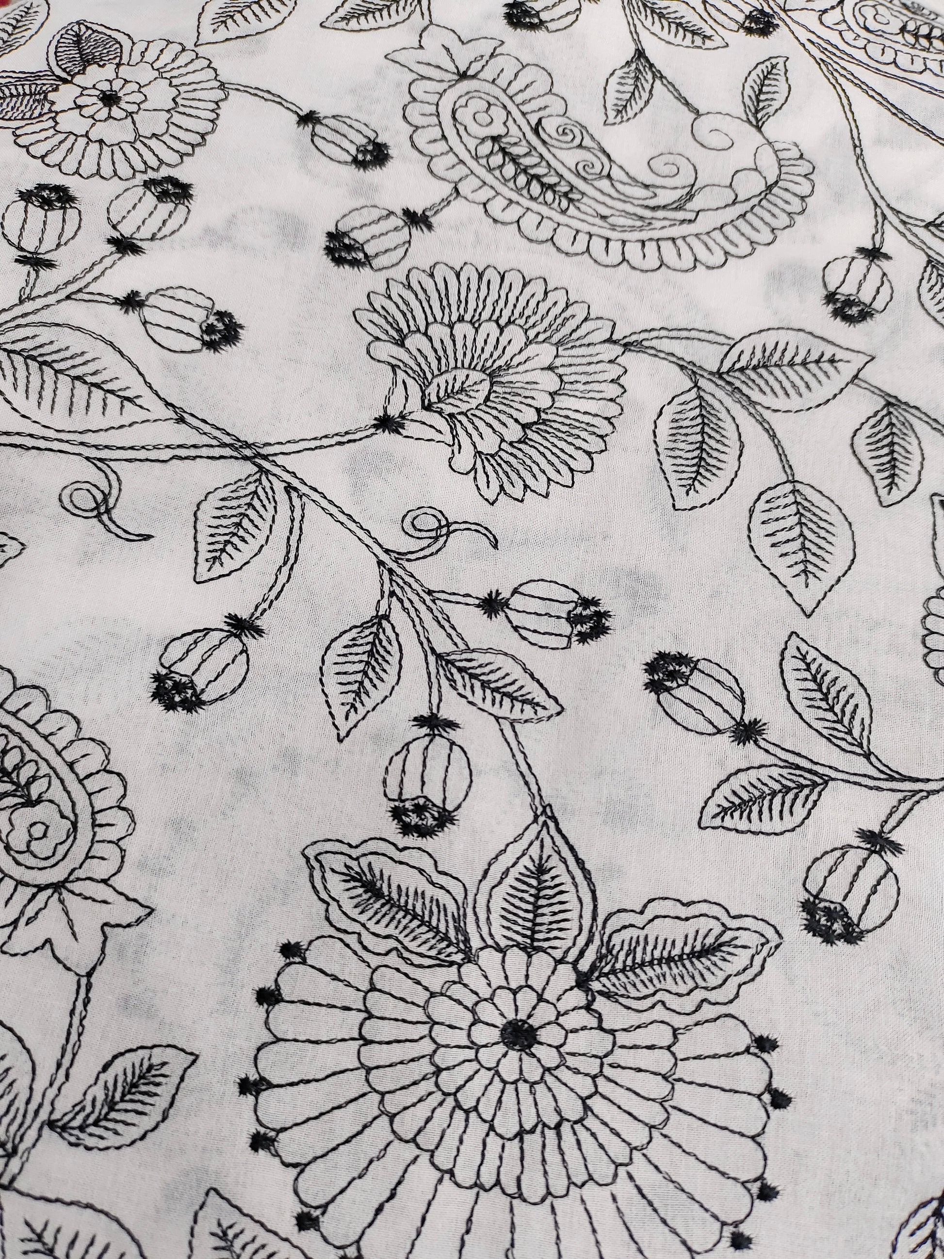 Voile fabric with black embroidery