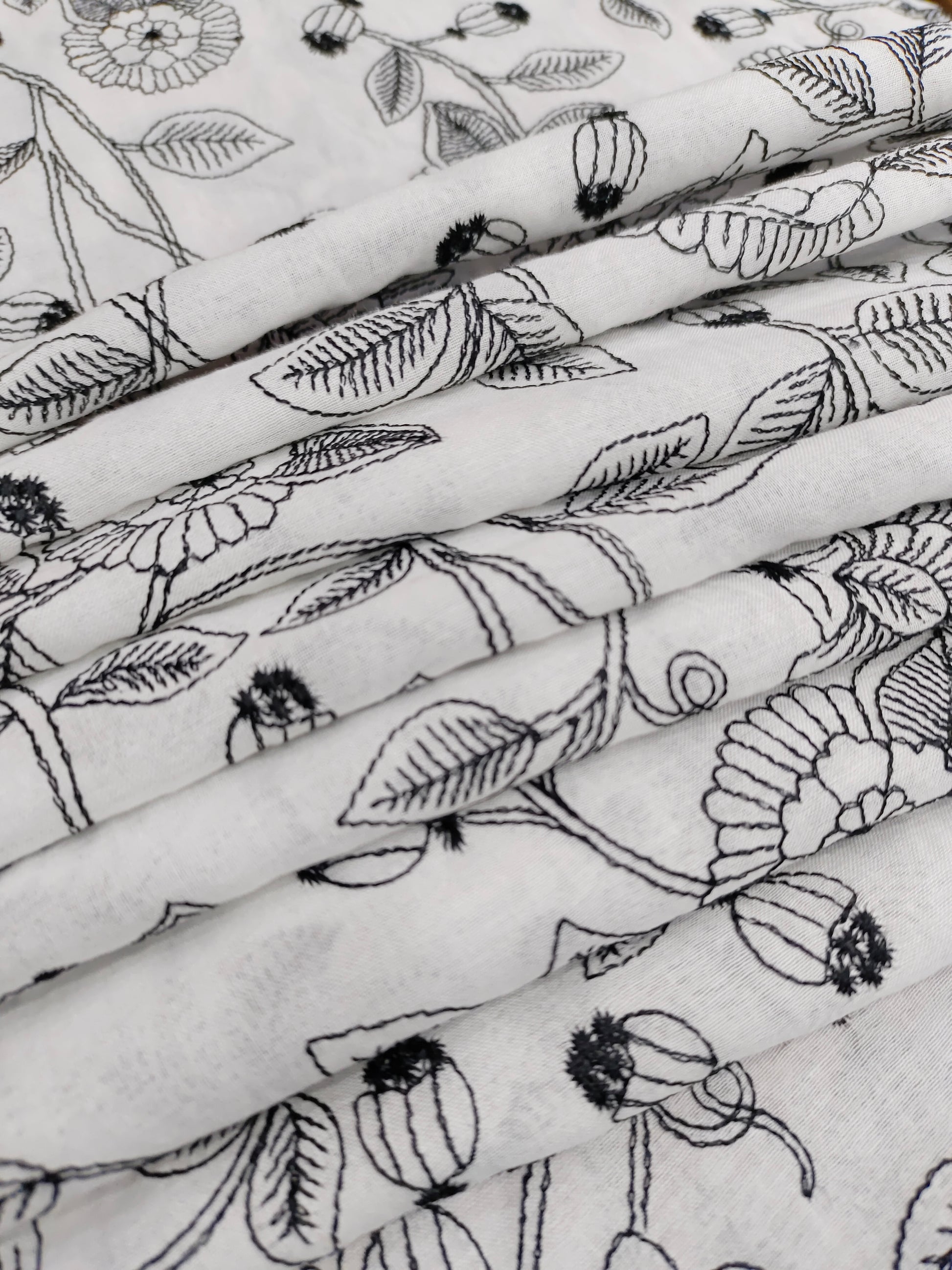 Voile fabric with black embroidery