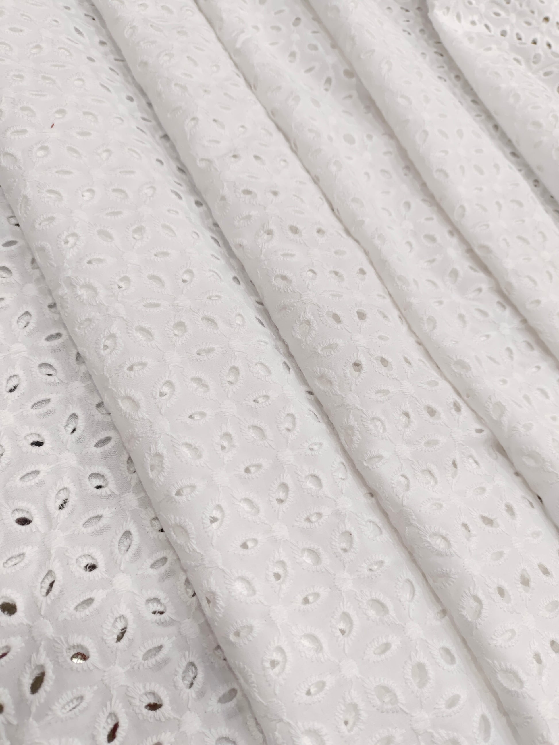 White embroidered cut work fabric