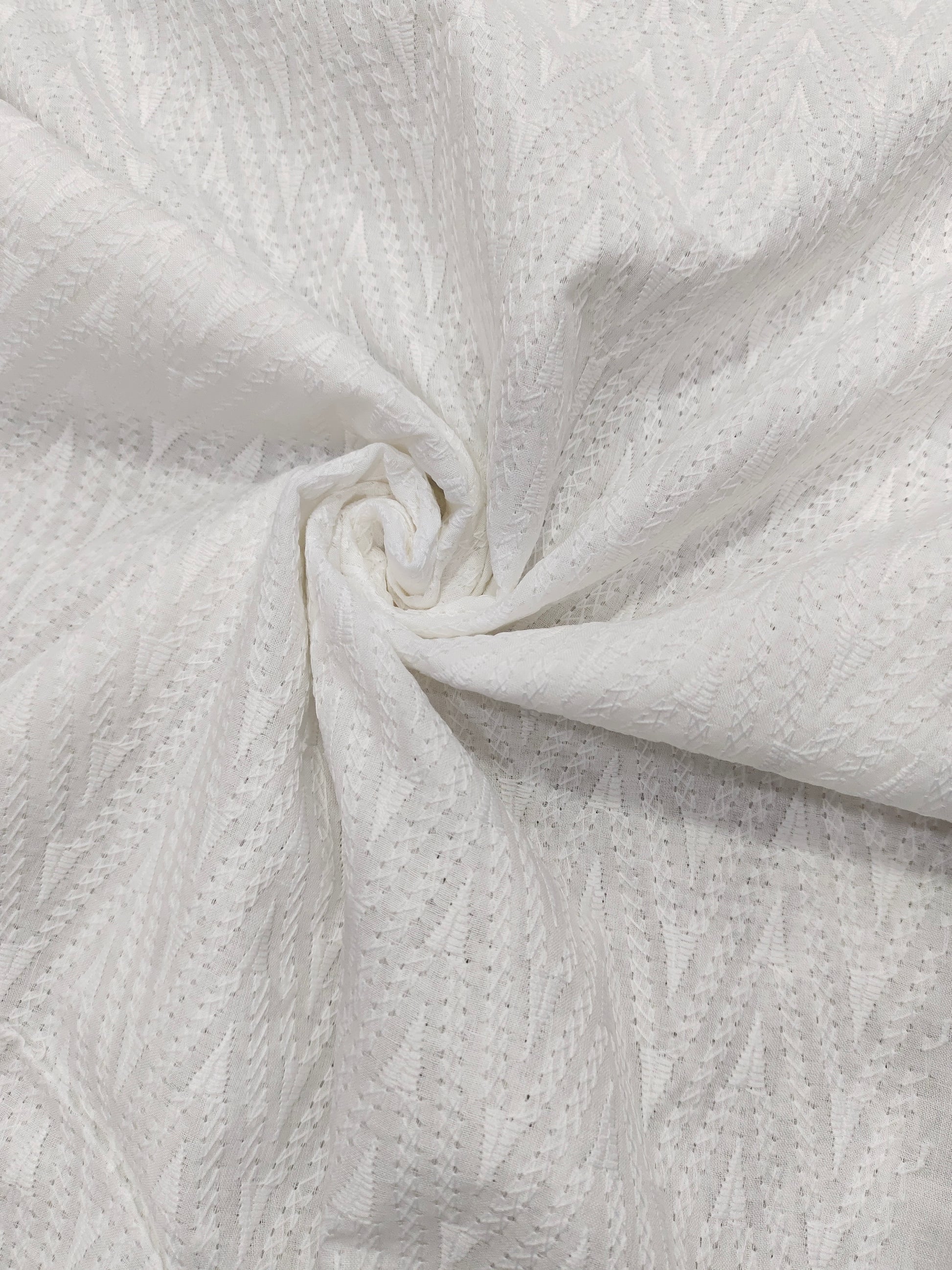 White cotton embroidered fabric