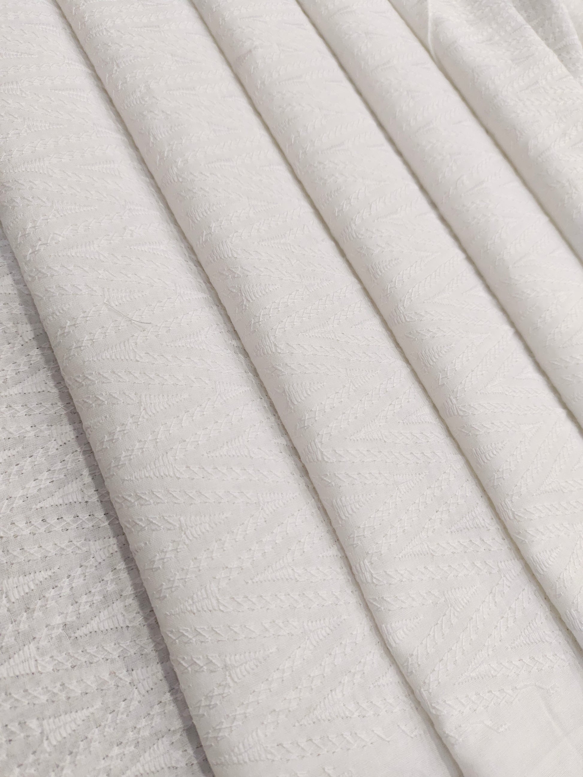 White cotton embroidered fabric