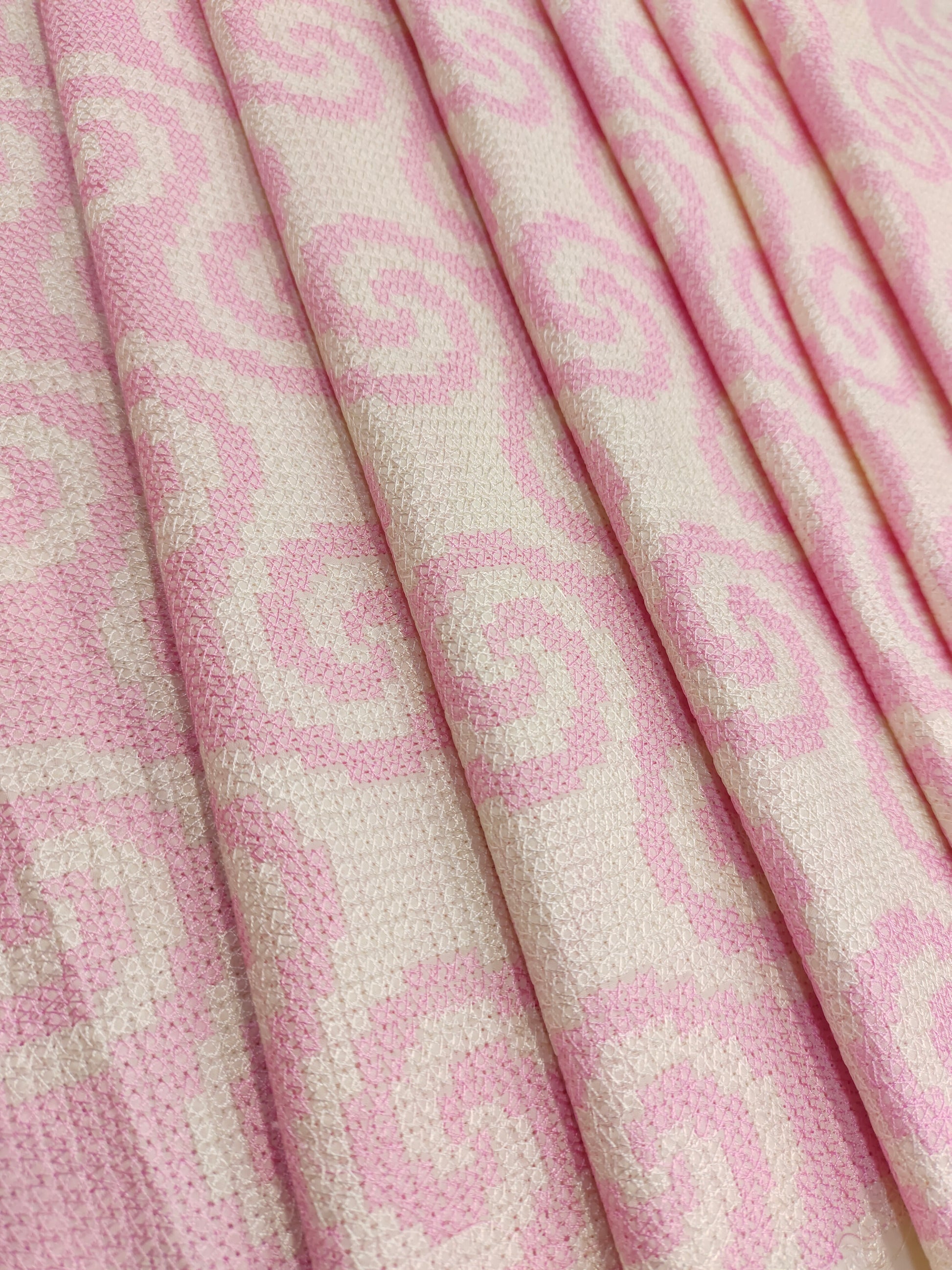 Cotton fabric with crosstitch work with pink and cream