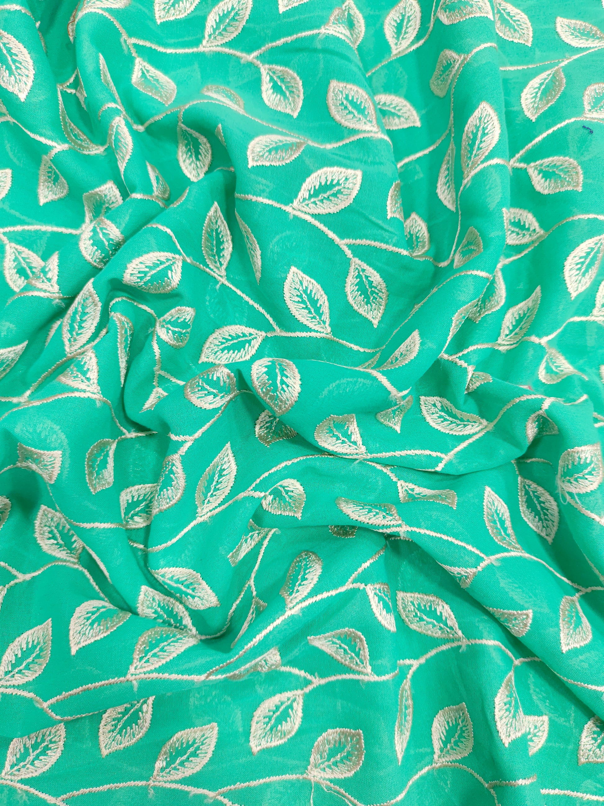 Voile embroidered fabric with beige leaves work