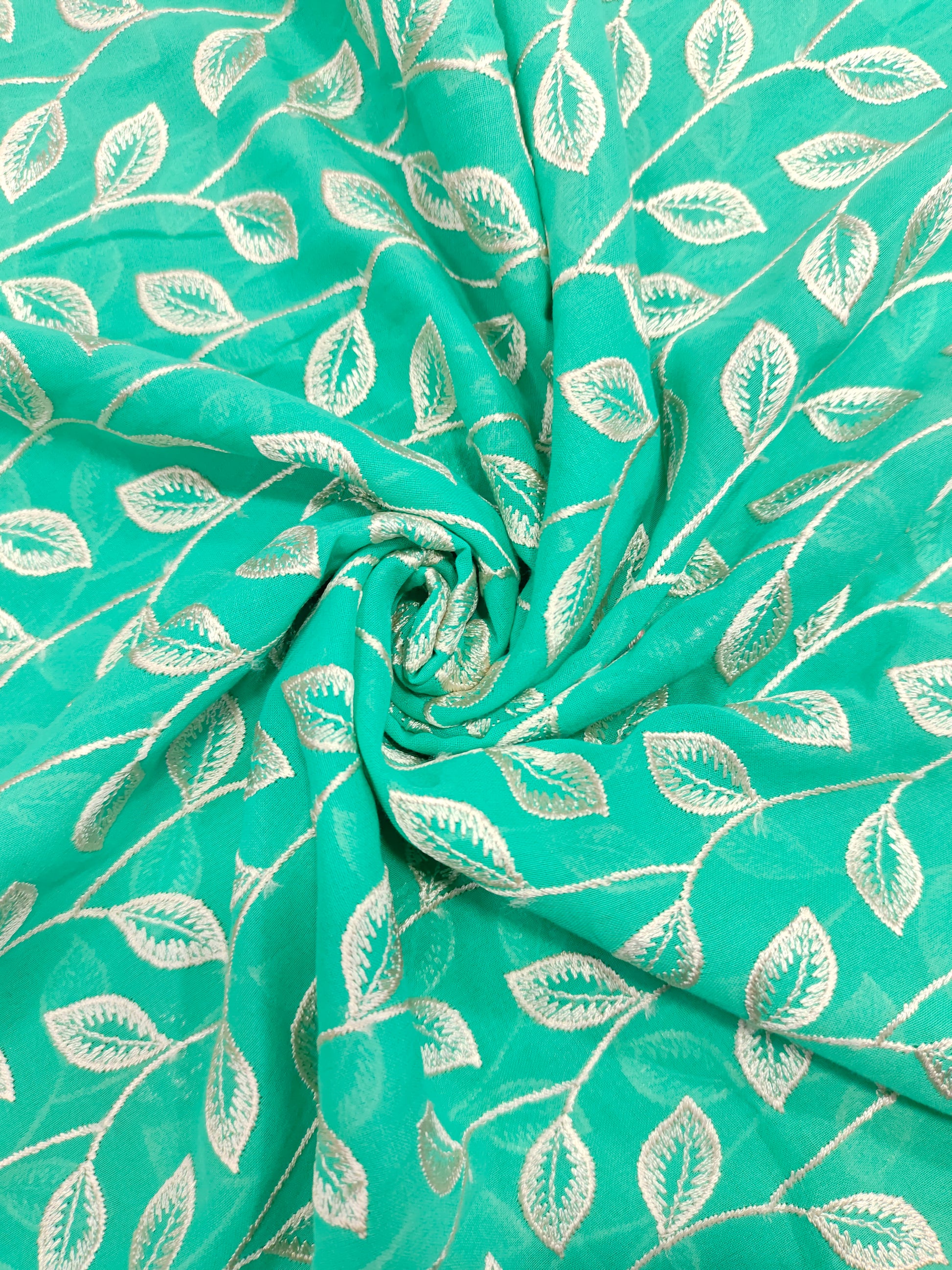 Voile embroidered fabric with beige leaves work