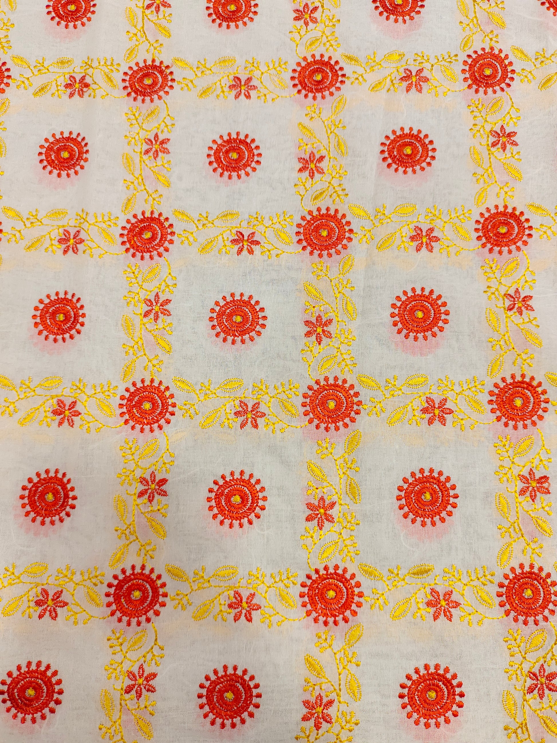 Voile yellow and orange embroidered fabric