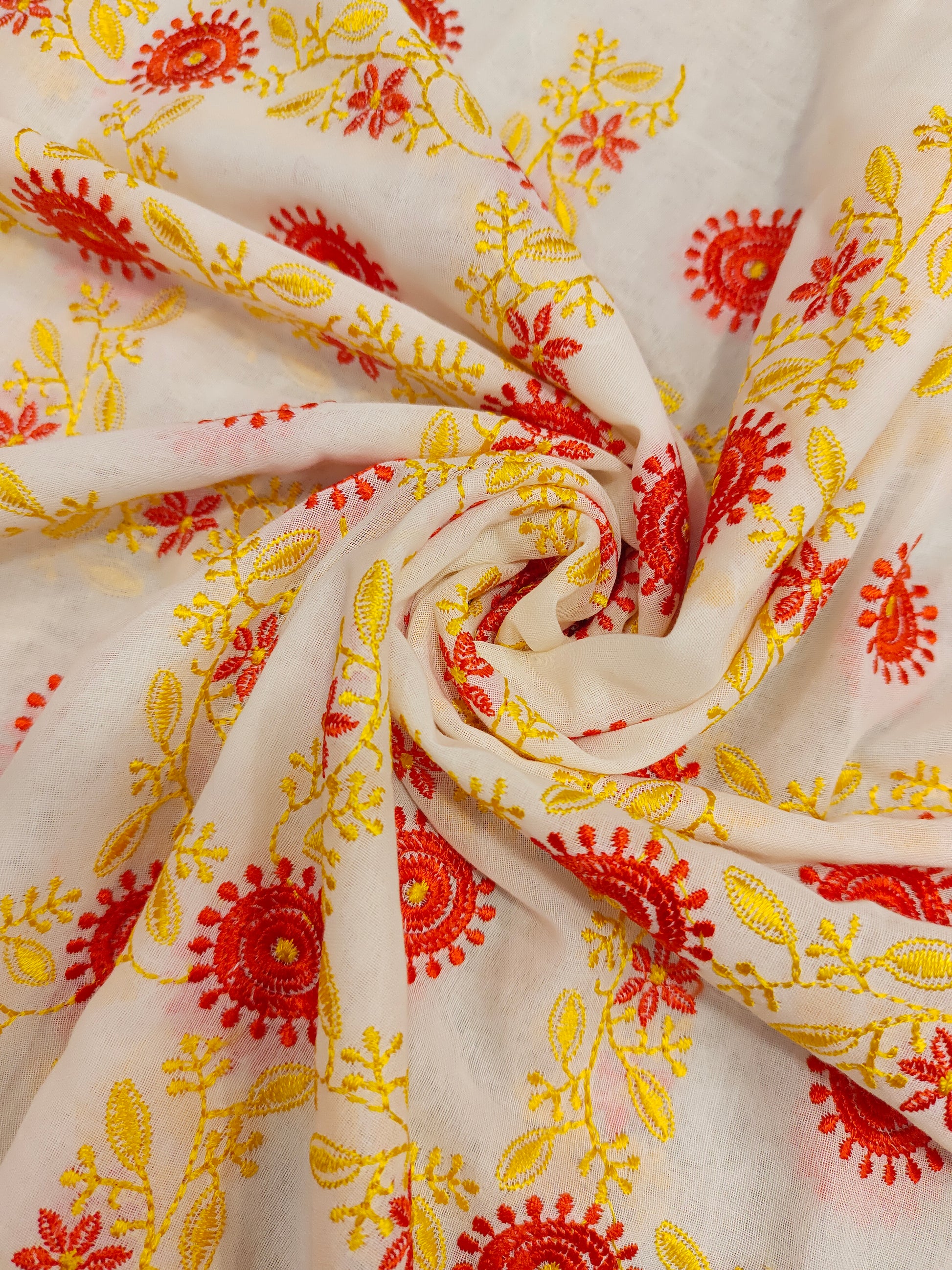 Voile yellow and orange embroidered fabric