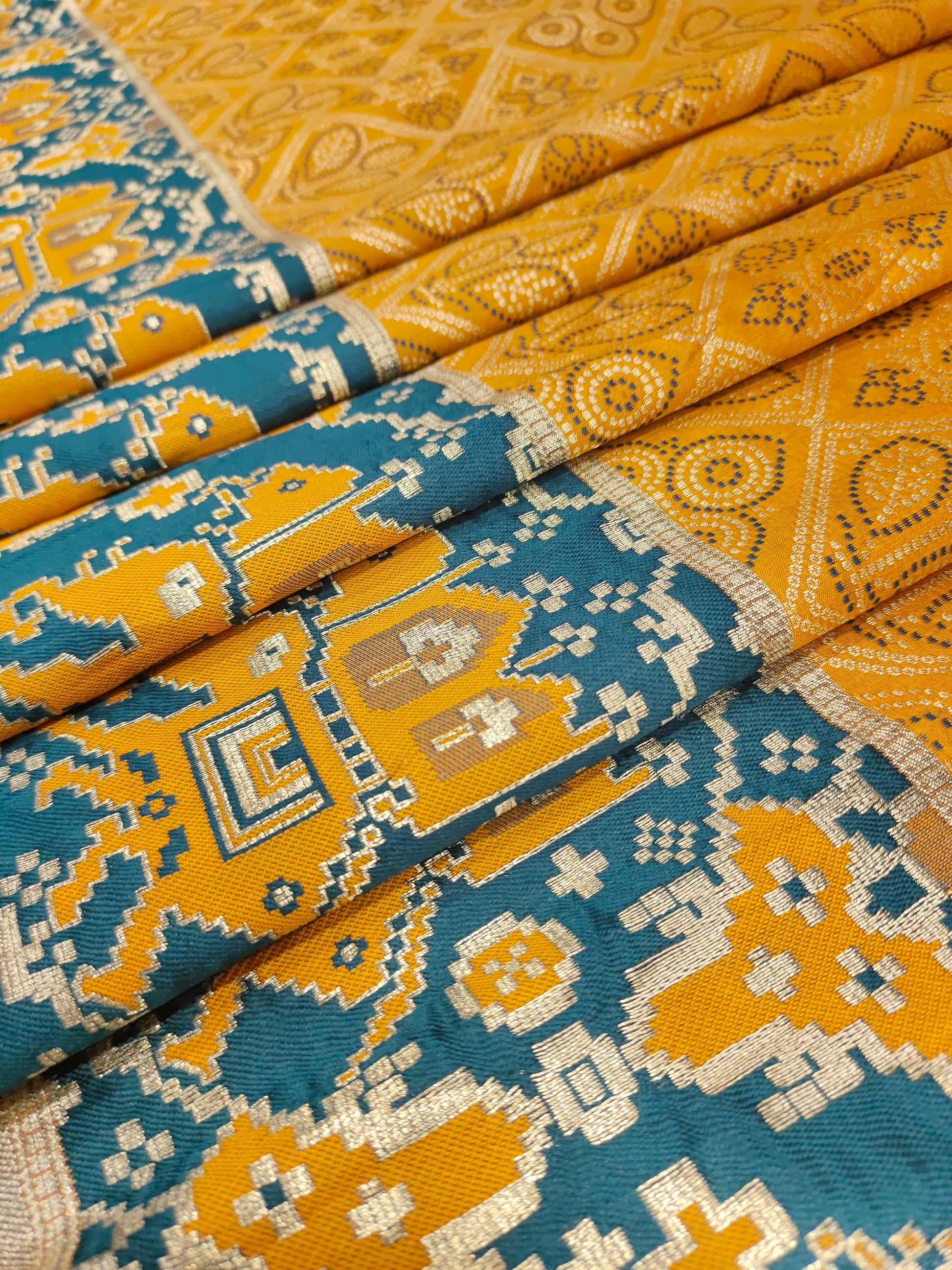 Mustard brocade with blue and gold border