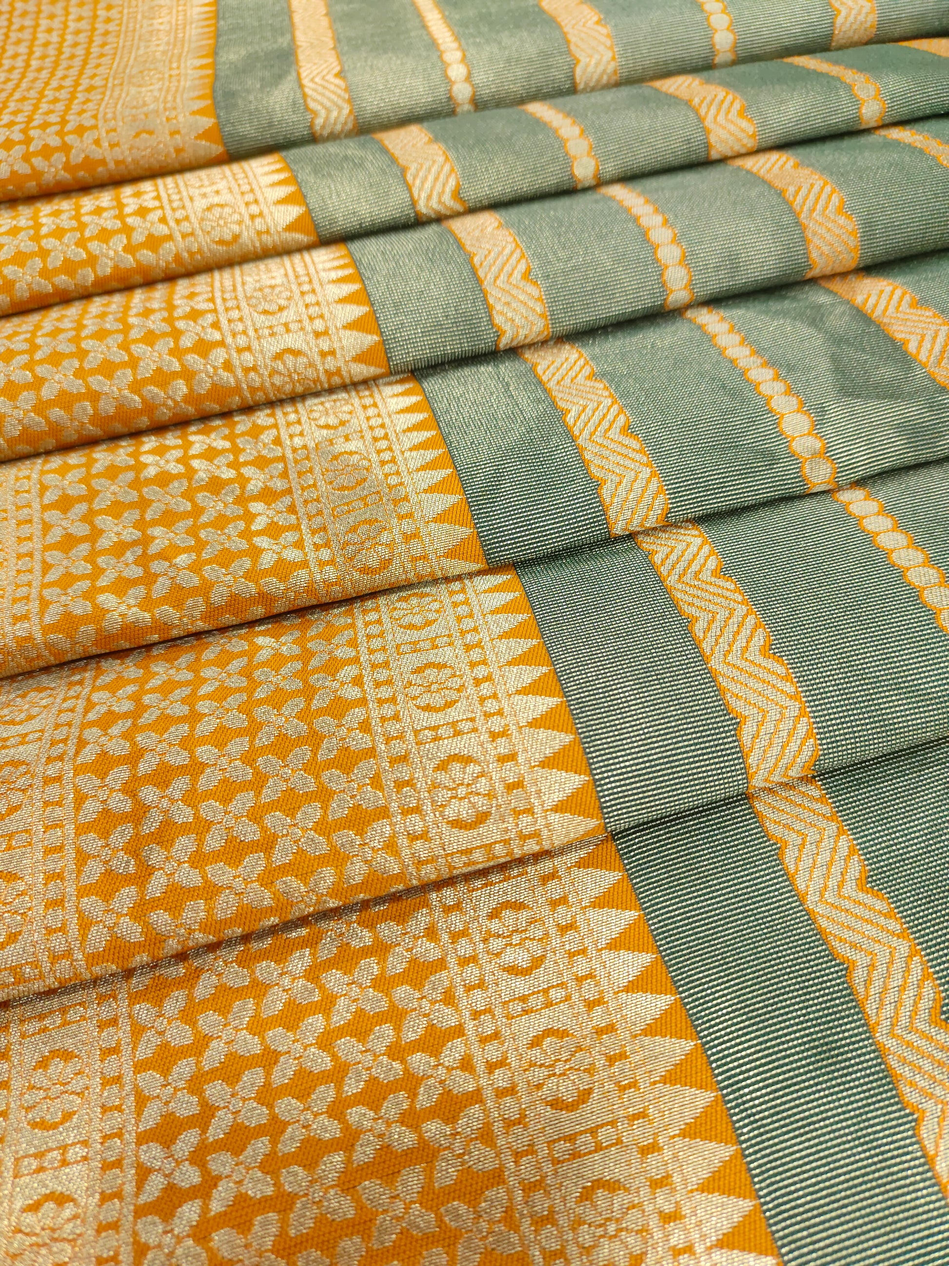 Banarasi sik with mehendi green and mango yellow color