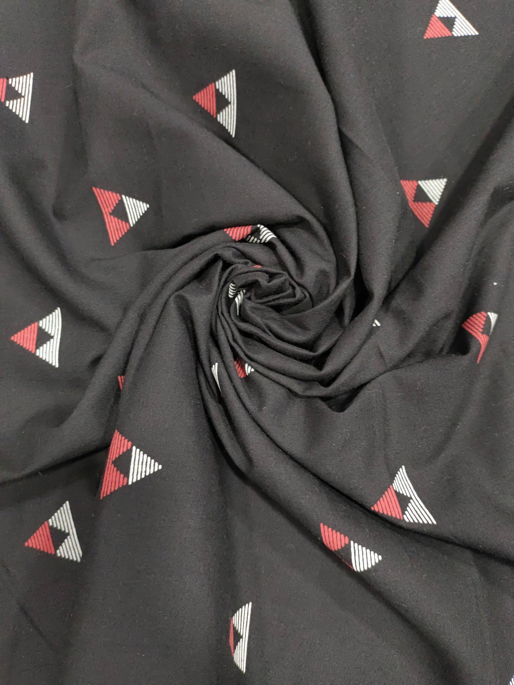 Black cotton fabric triangle print with off white and maroon