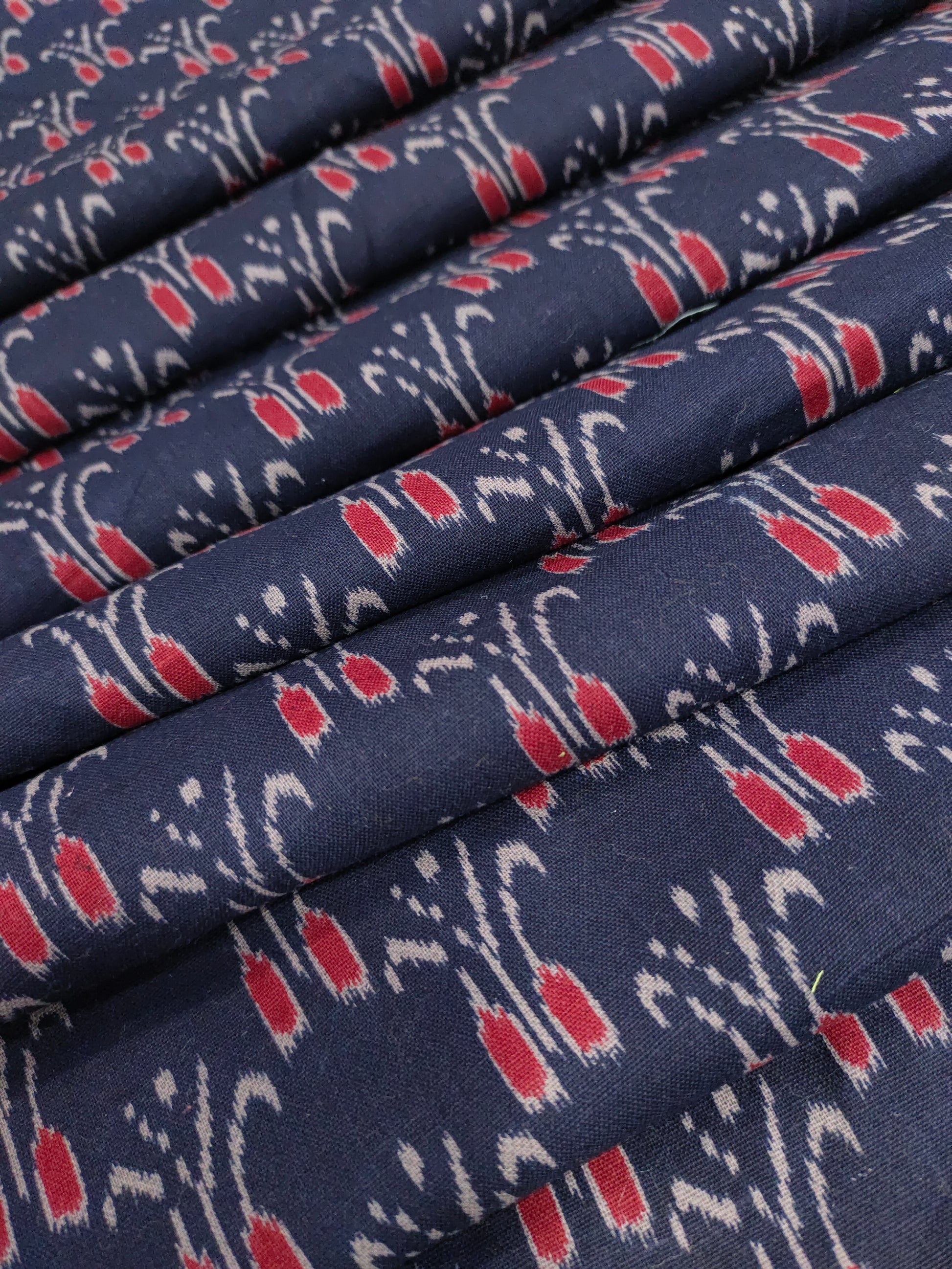 Navy blue cotton ikkat on with red and small border