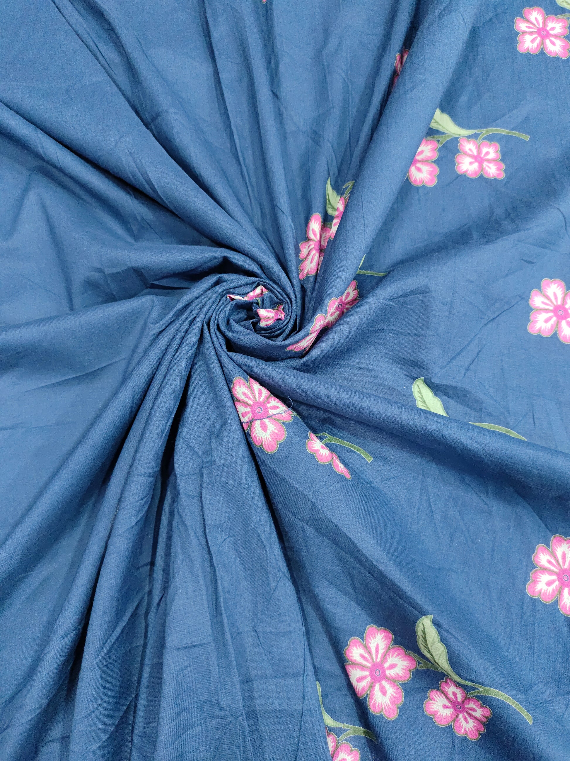 Jaipur cotton daman print wink on blue fabric