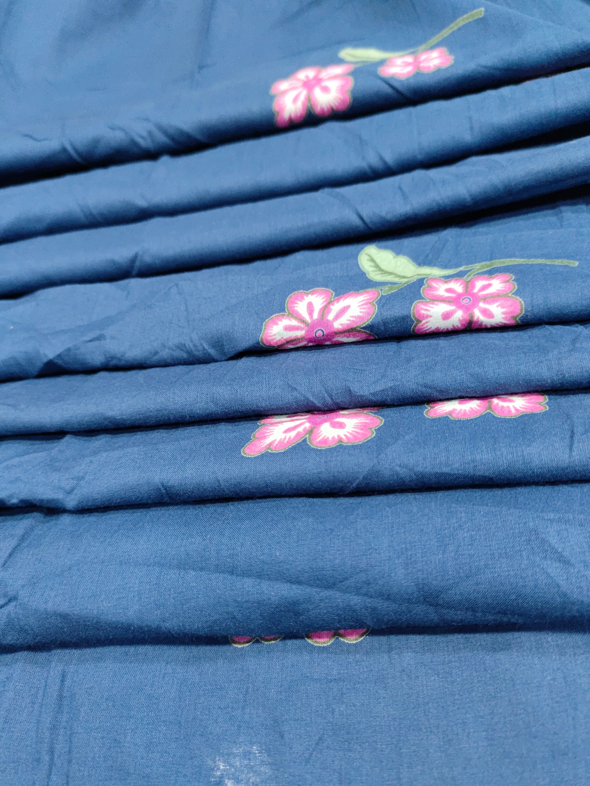 Jaipur cotton daman print wink on blue fabric