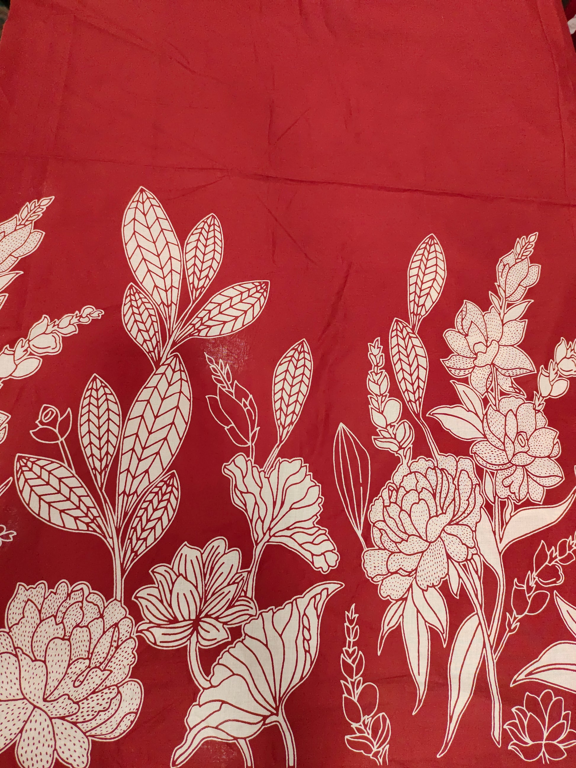 Jaipur cotton daman print on red fabric
