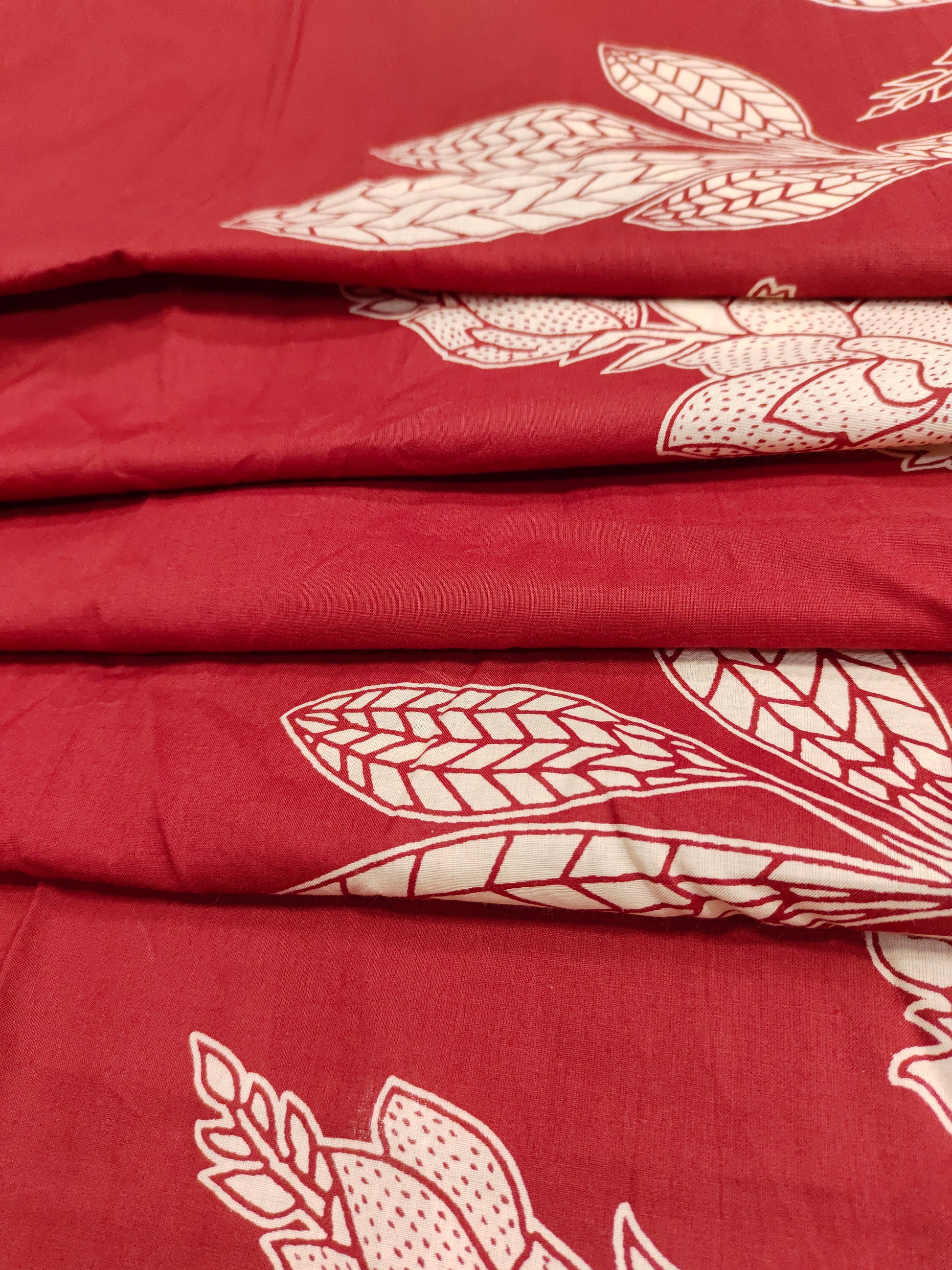 Jaipur cotton daman print on red fabric