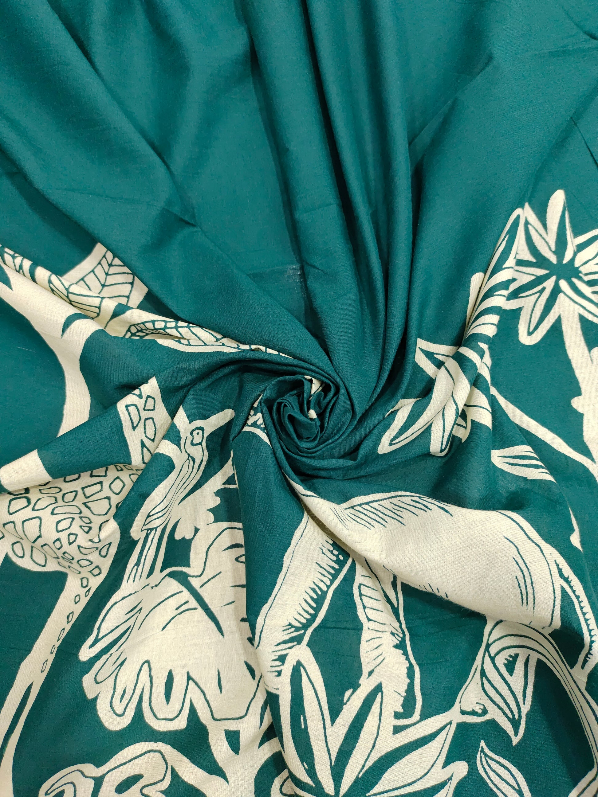 Jaipur cotton daman print on bottle green fabric