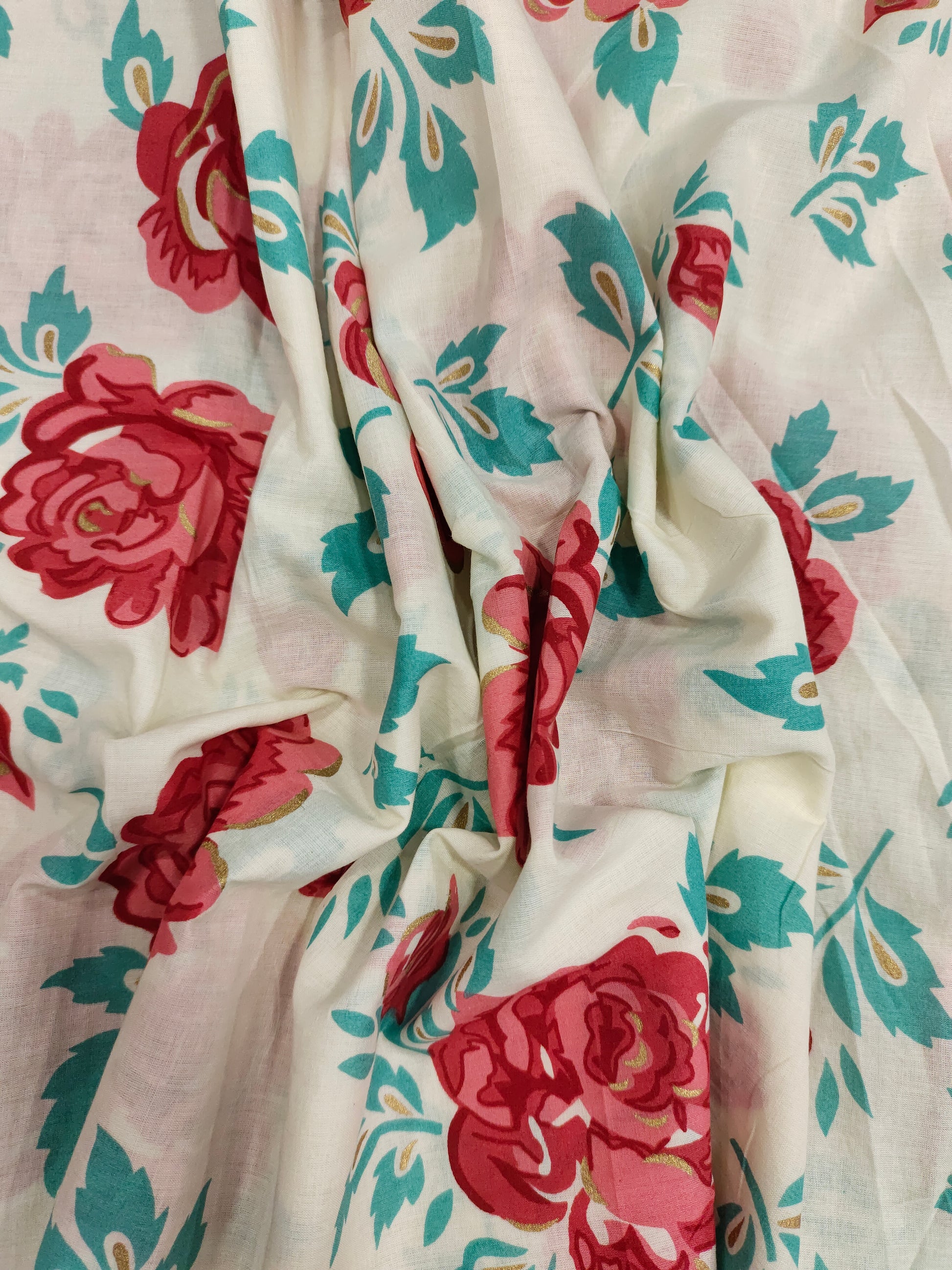 Off white base with red roses with all over